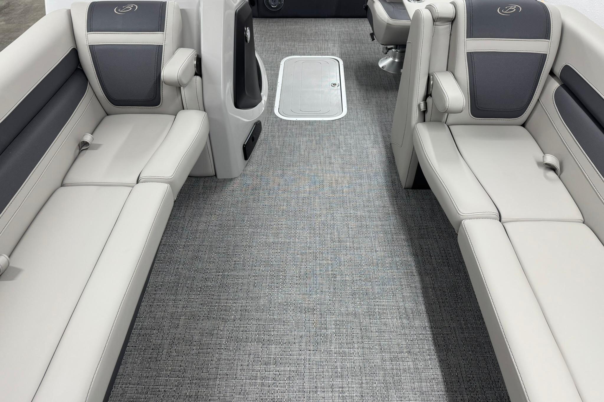 2025 Barletta Cabrio 24UC interior with gray seating and flooring.