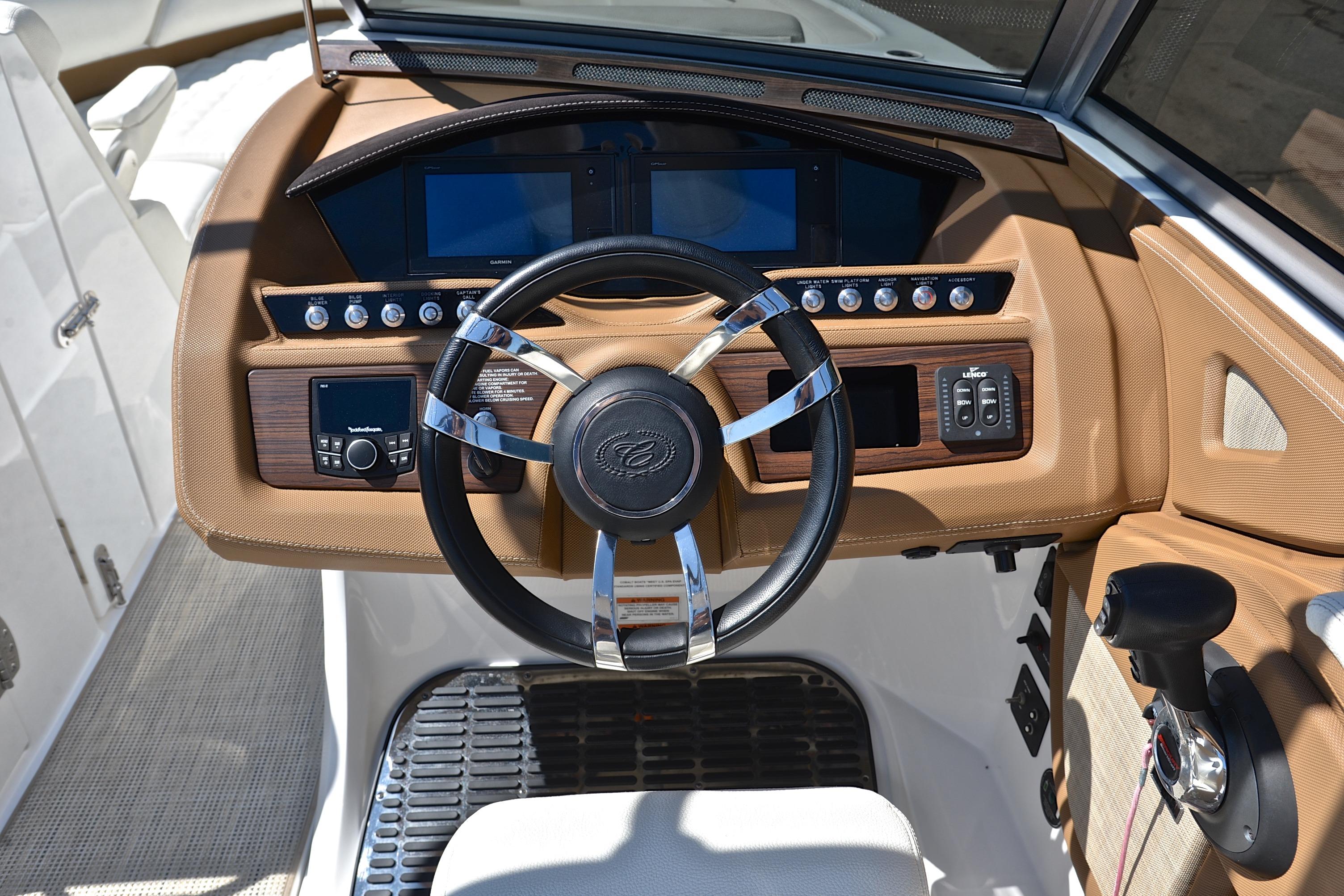 2018 Cobalt R7 boat dashboard with steering wheel and control panel.