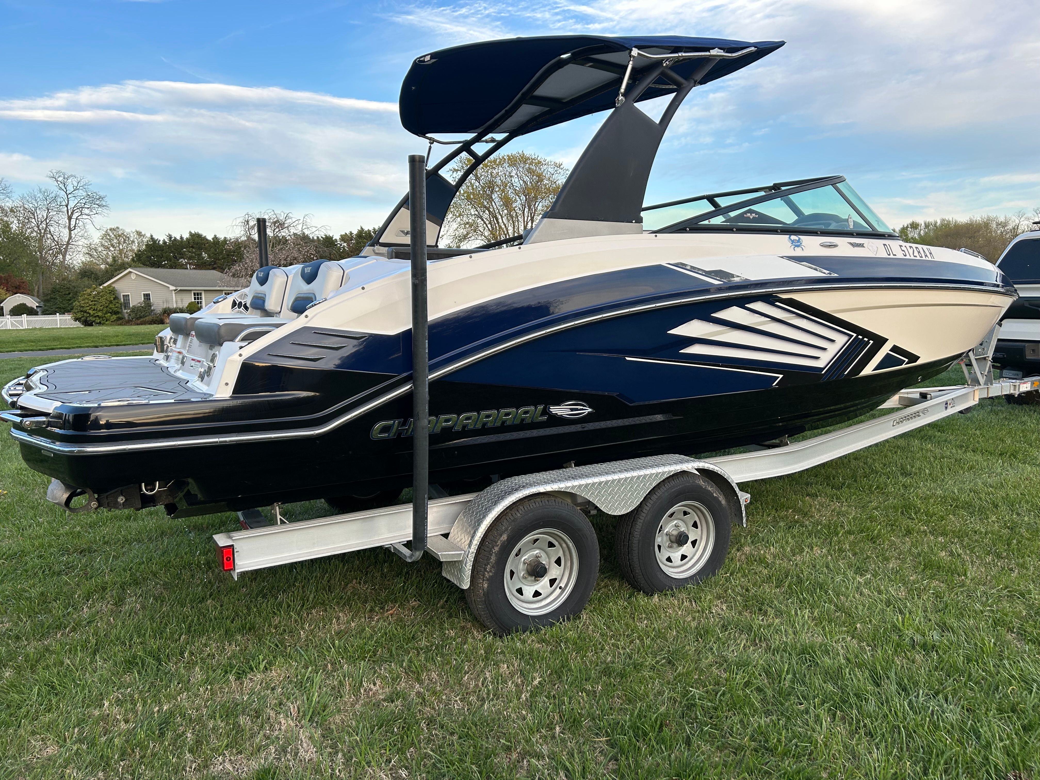 2015 Chaparral Vortex 243 VRX boat on trailer outdoors.