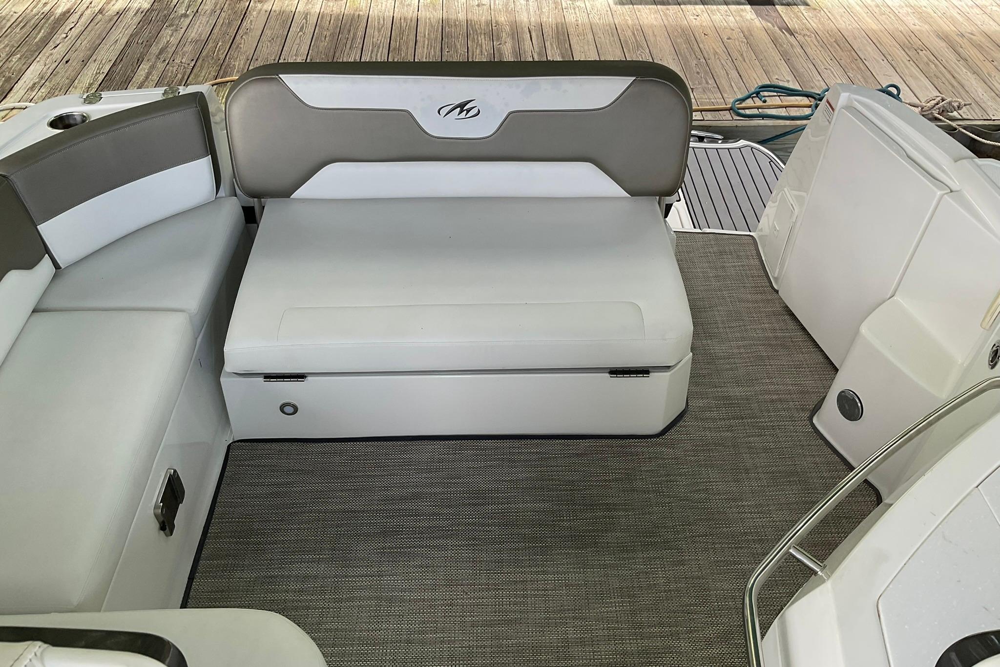 2019 Monterey 335 Sport Yacht interior seating with gray and white upholstery.