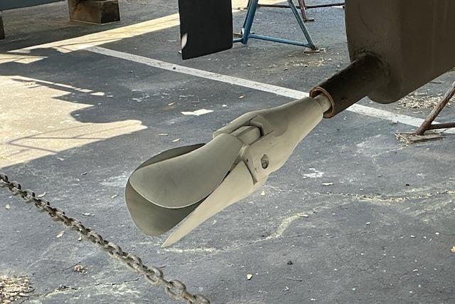 Propeller of a 2000 Beneteau Oceanis 321 sailboat on a dry dock.