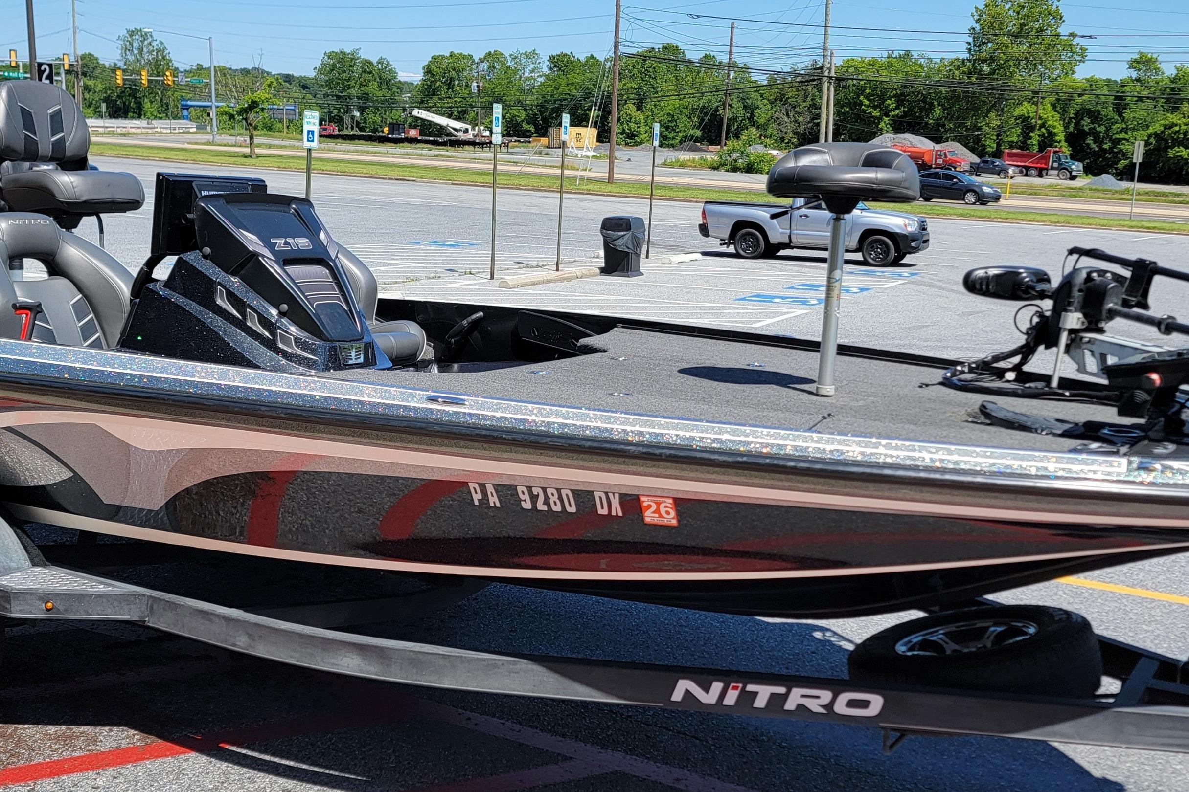 2020 Nitro Z19 Pro boat in parking lot, showcasing sleek design and modern features.