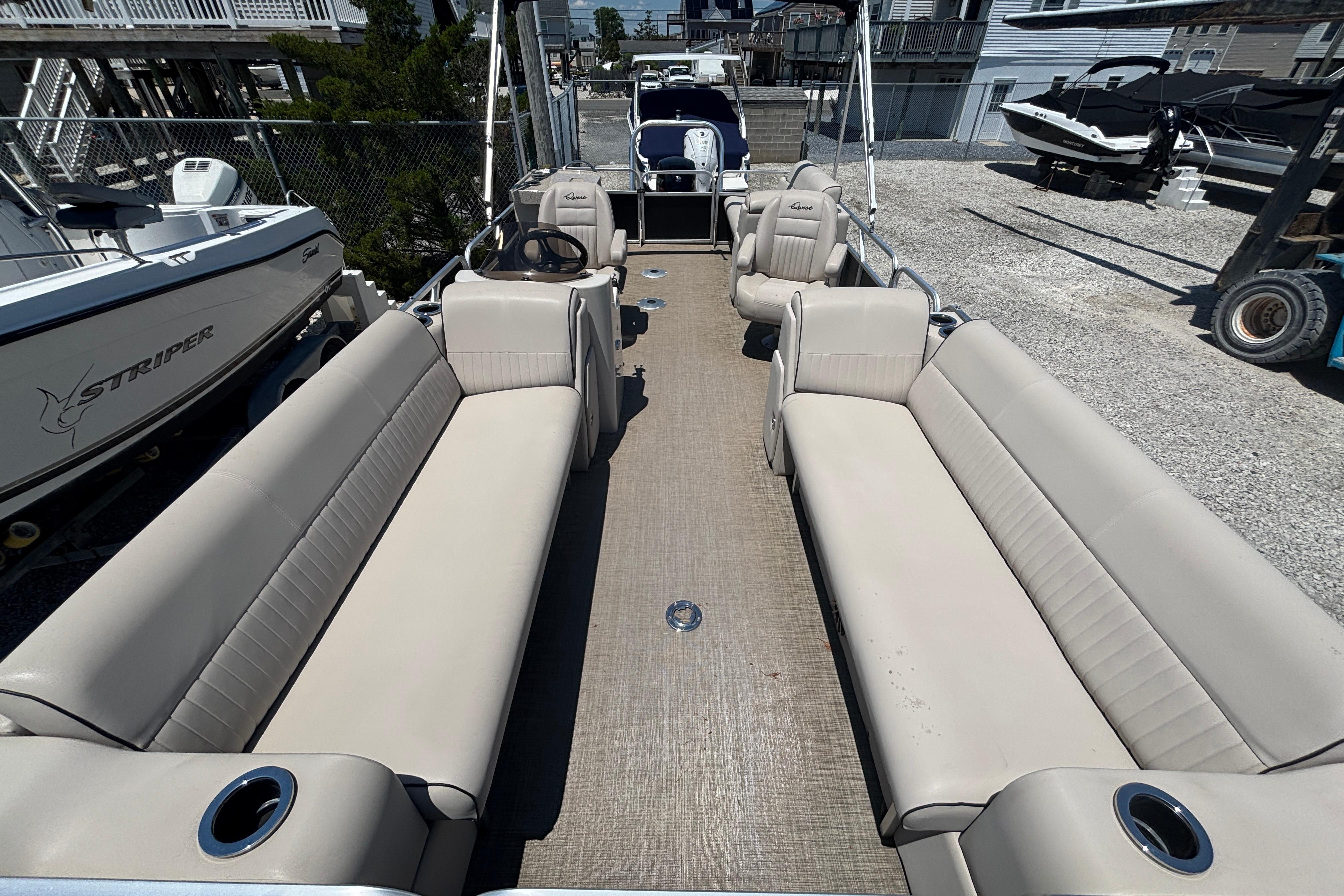 2017 Qwest LS 822 Bar pontoon boat with spacious seating and modern design.