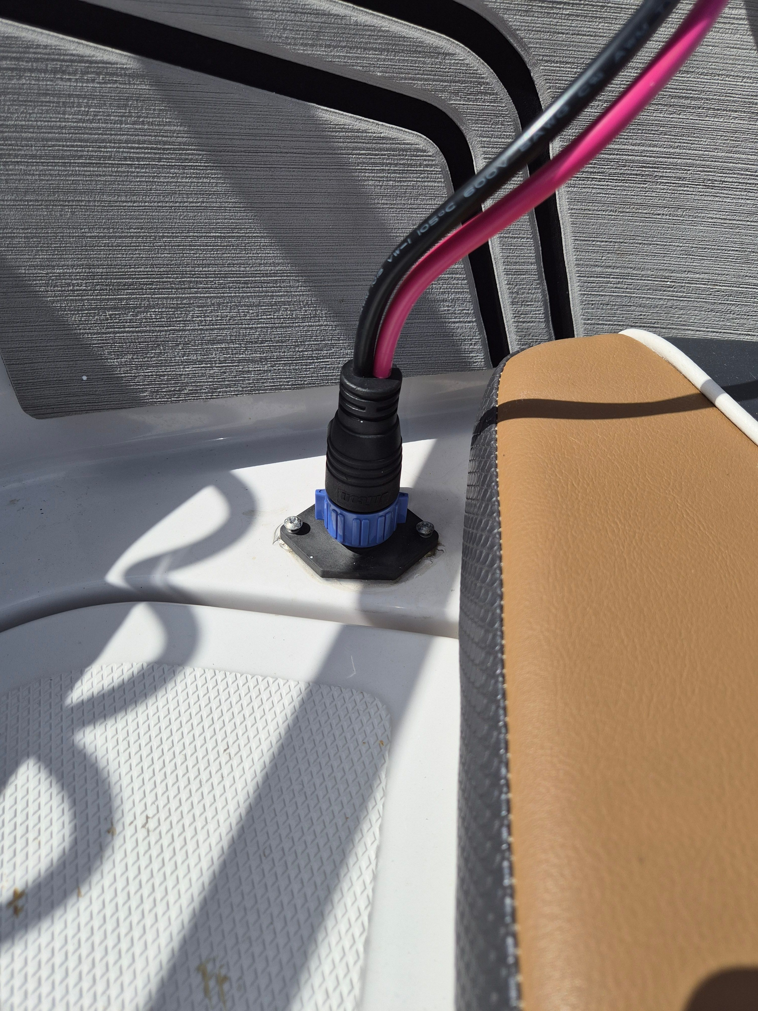 Close-up of a cable connection on a Scarab 255 Open ID boat.