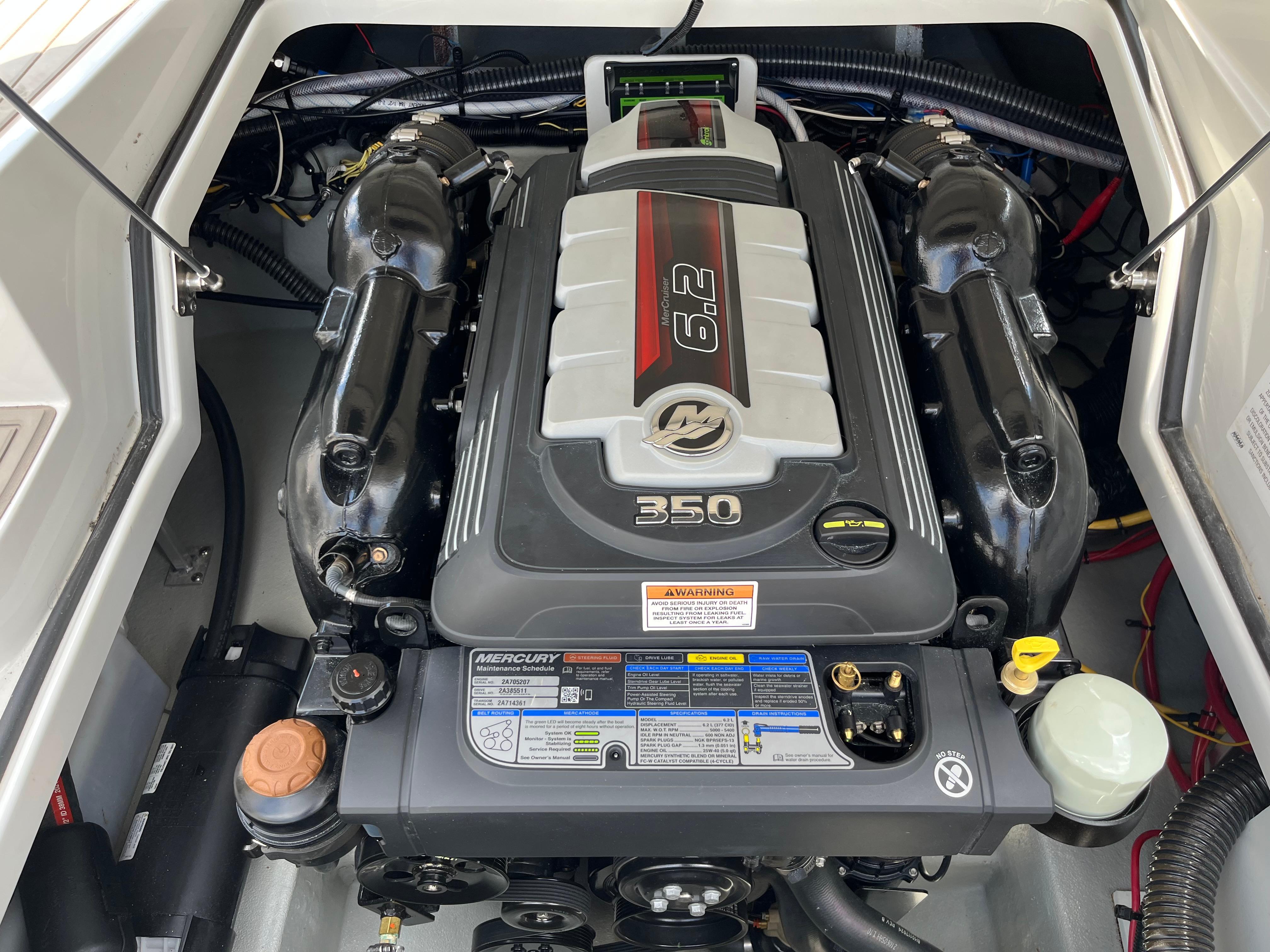 Engine compartment of a 2022 Crownline 280 SS boat featuring a Mercury 6.2L 350 HP engine.
