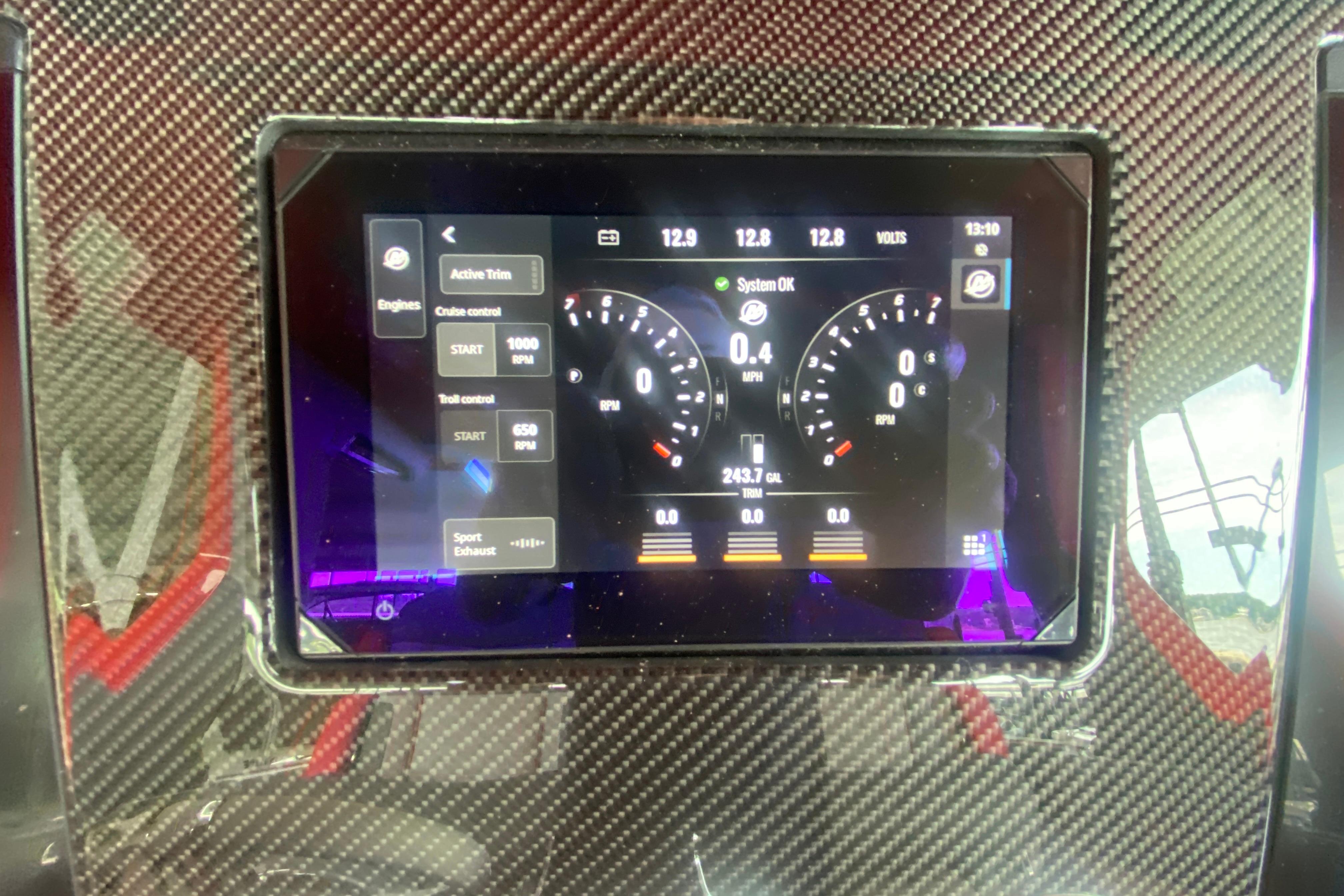 Dashboard display of 2025 Fountain 38 SCX boat, showing speed, RPM, and system status.