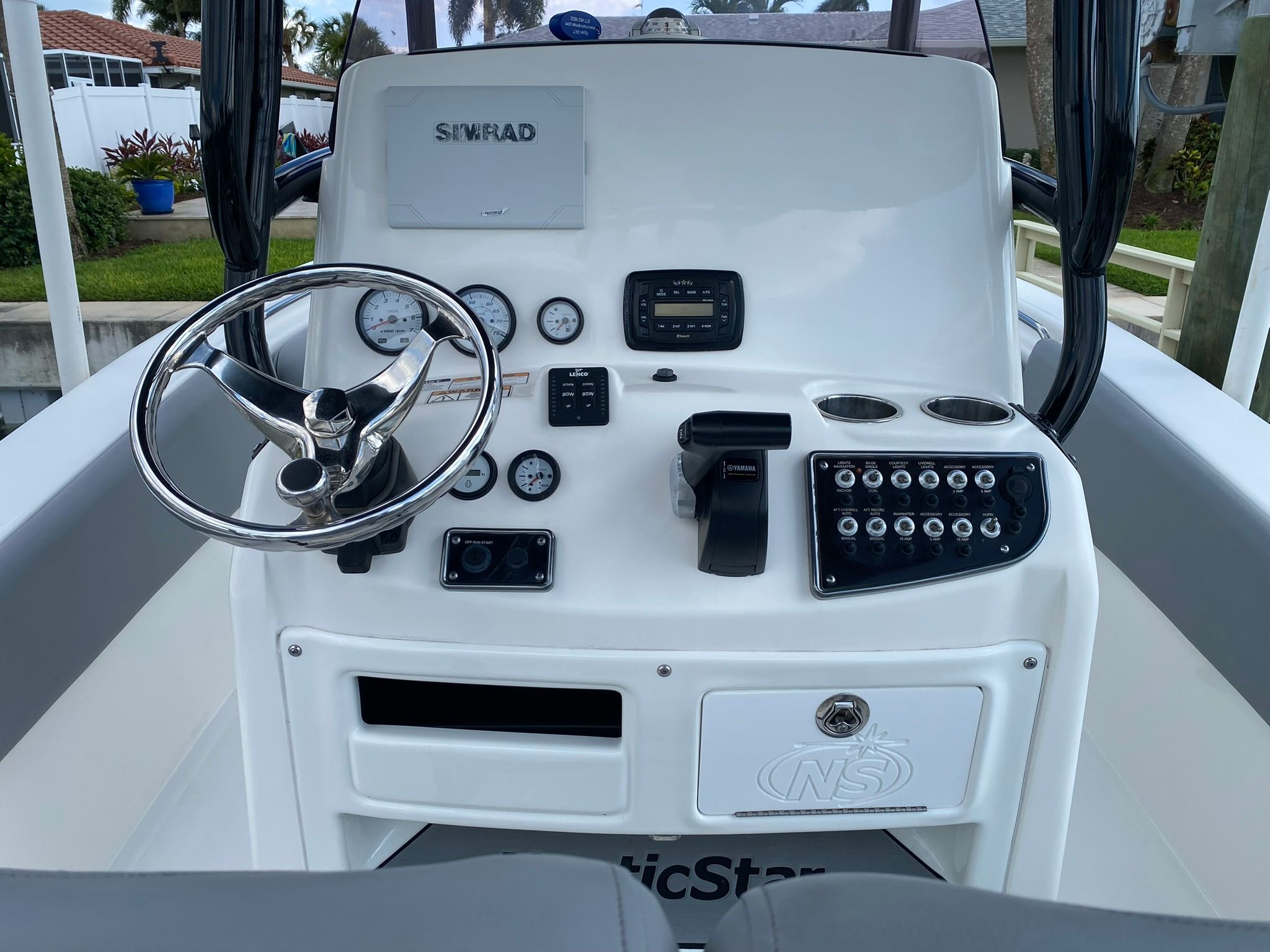 NauticStar Legacy 2021 boat console with controls and instruments.