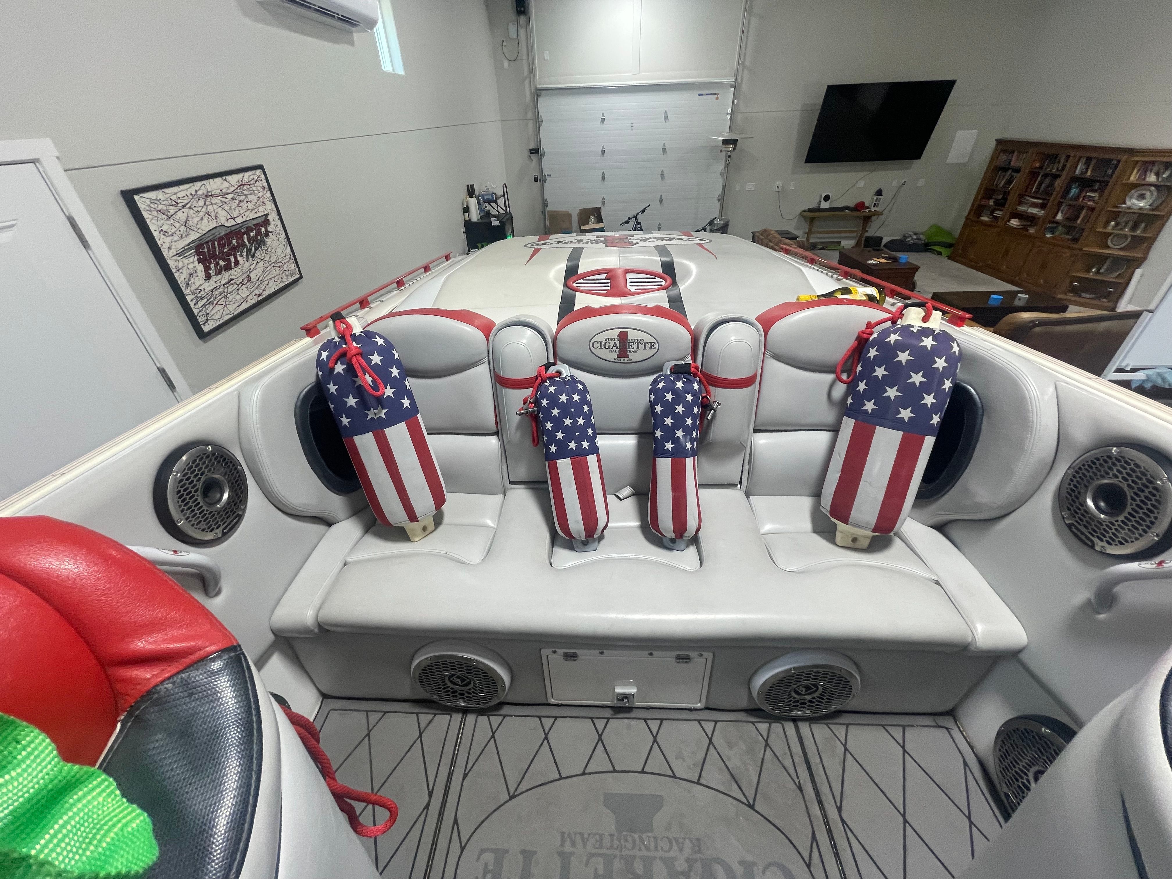 Interior of a 2004 Cigarette 38' Top Gun boat with American flag cushions.
