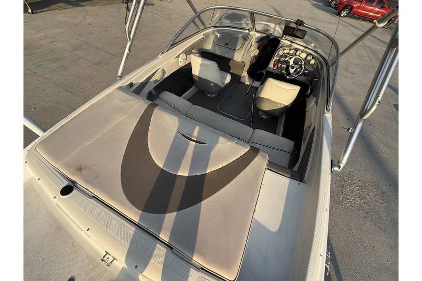 2008 Bayliner 185 Bowrider interior with seating and dashboard view.