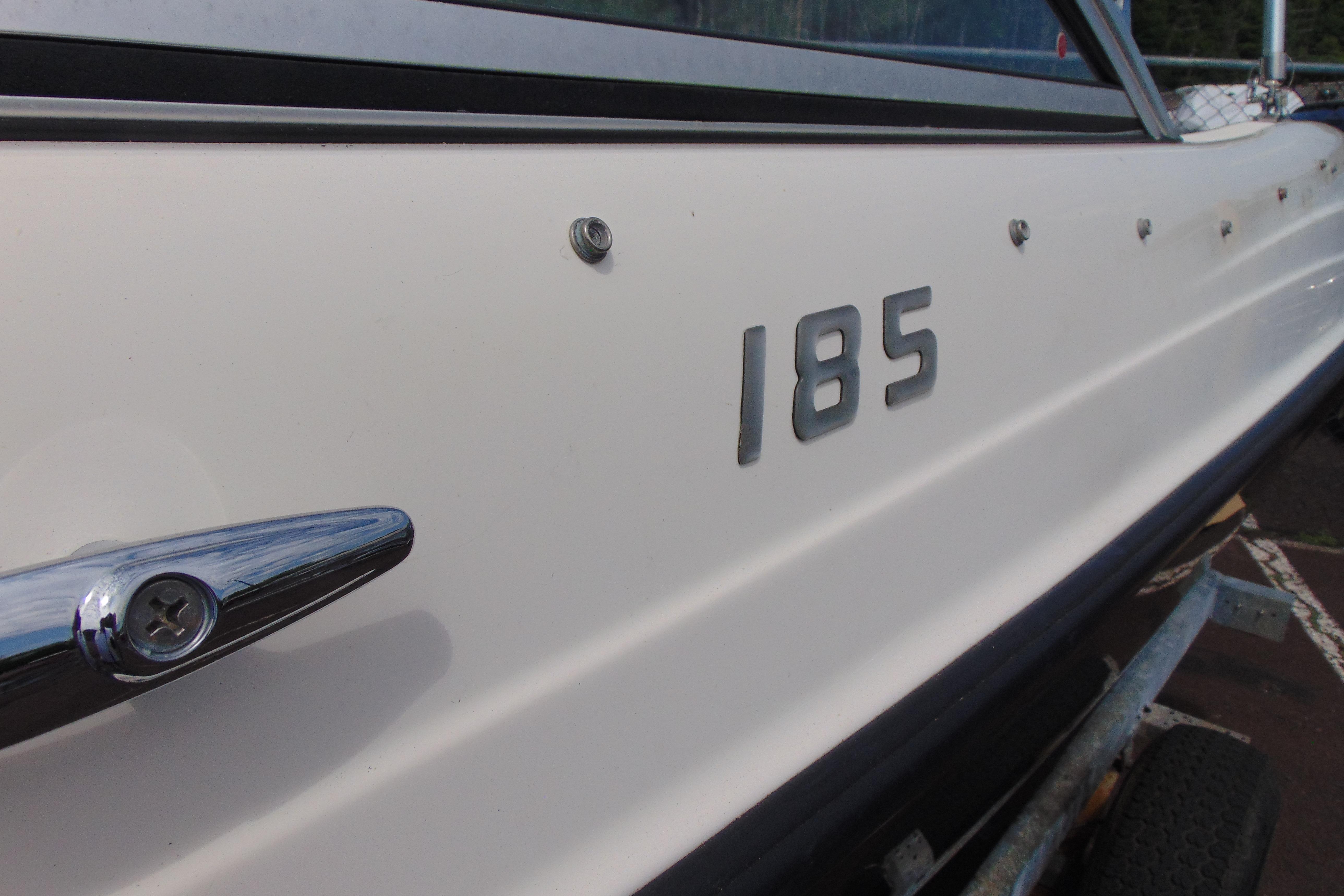 2012 Bayliner 185 Bowrider boat side view with chrome details.