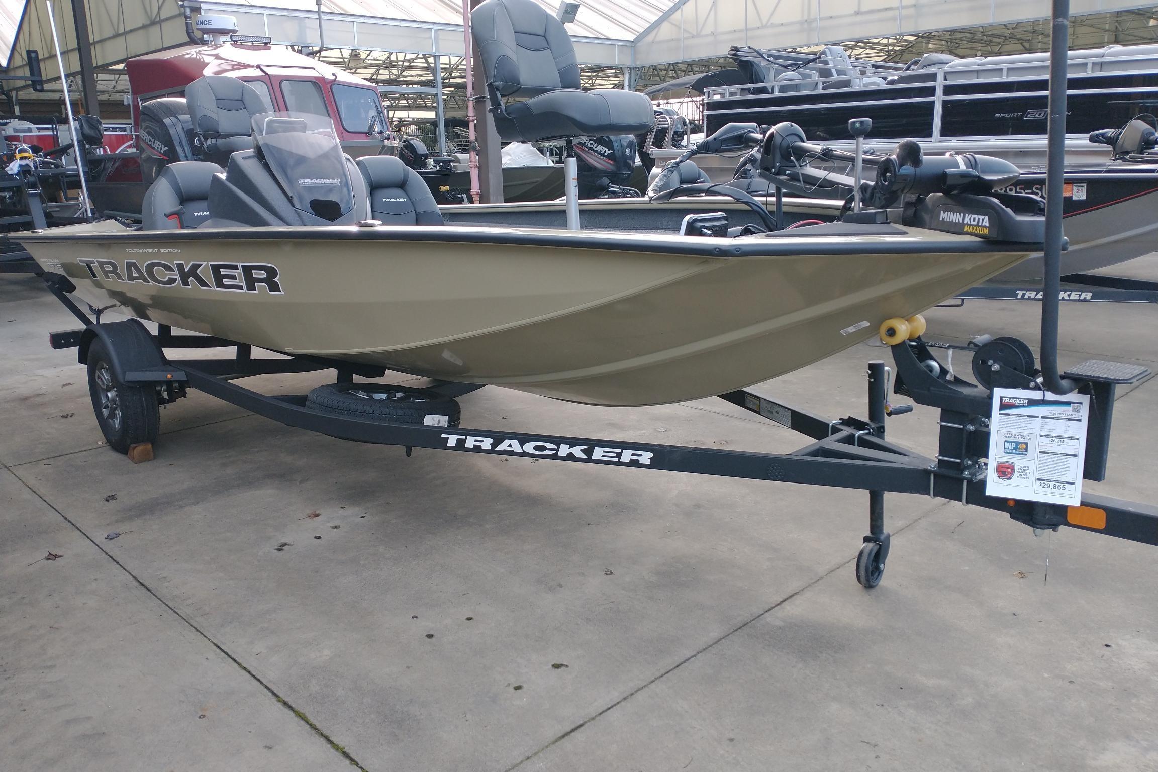 2026 Tracker Pro Team 175 boat on trailer in showroom display.