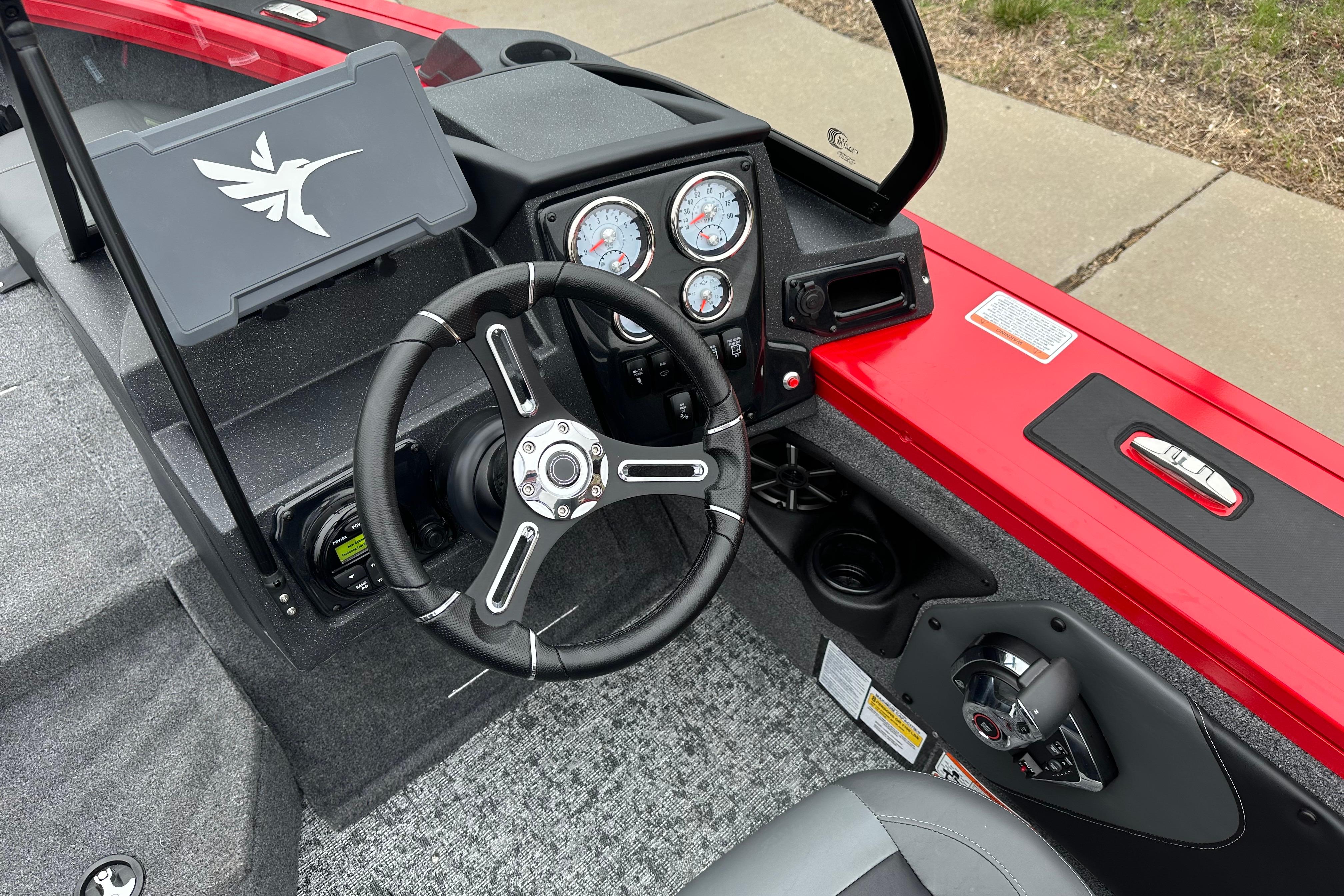 2026 Tracker Targa V-19 Combo boat dashboard with steering wheel and gauges.