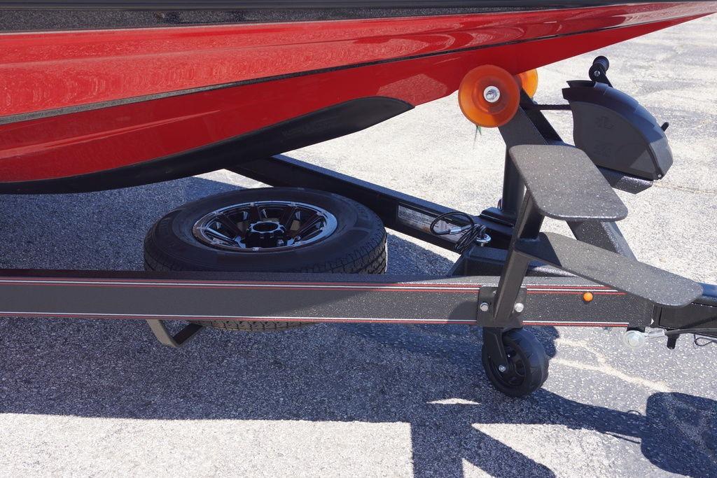 Red Skeeter ZXE21 boat trailer with spare tire, 2026 model.