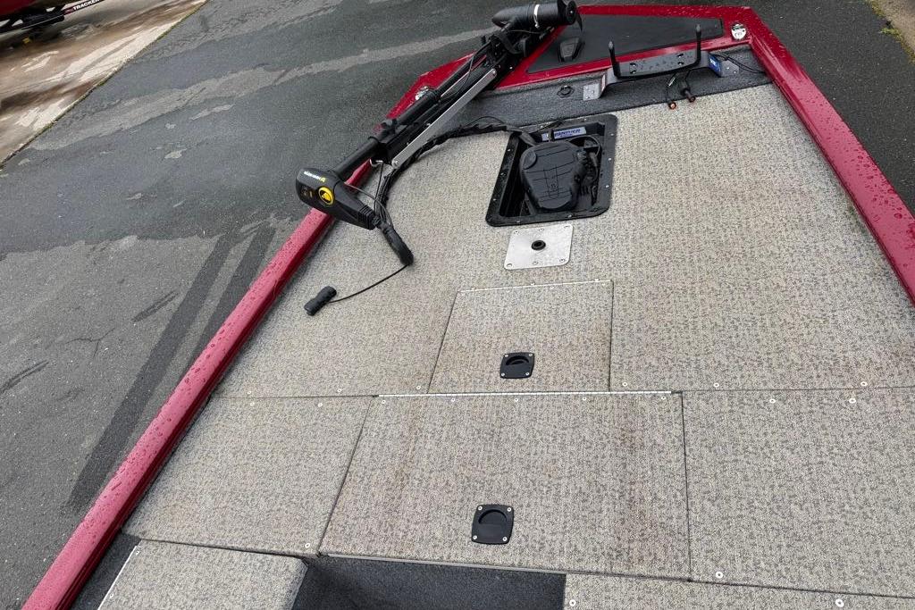 2022 Tracker Pro 170 boat deck with trolling motor and storage compartments.