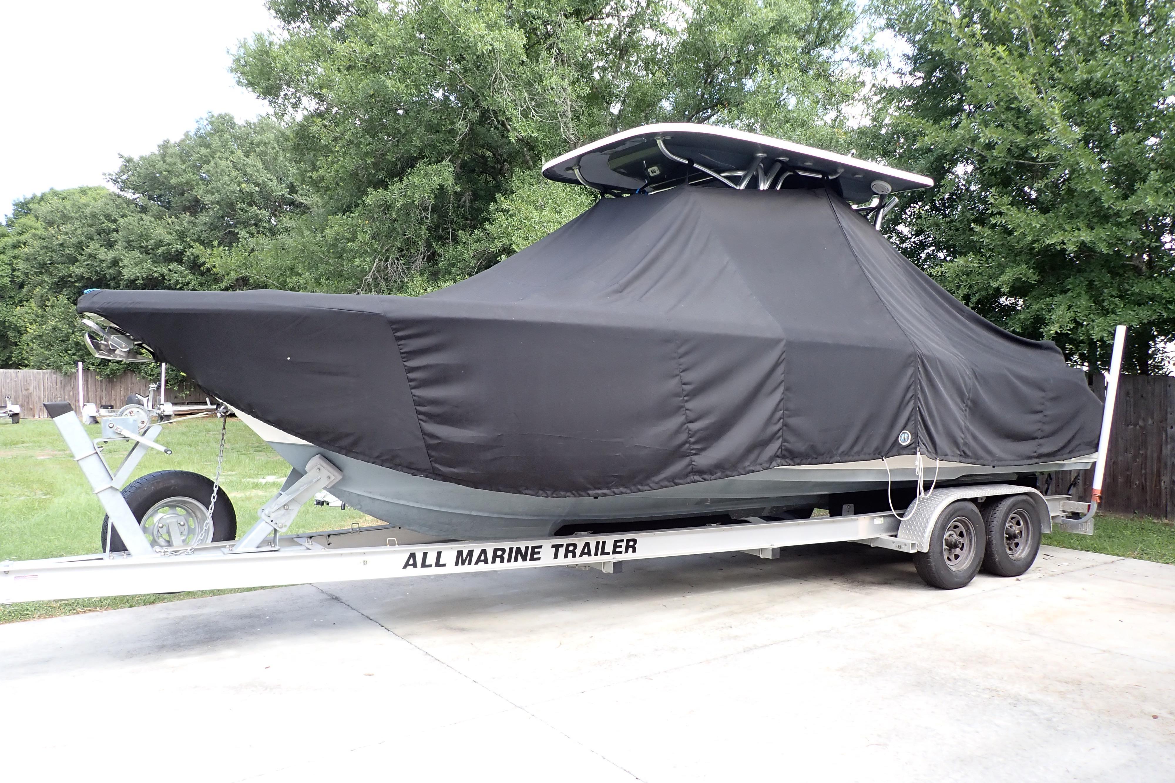2019 Key West 263 FS boat covered on trailer, parked outdoors.