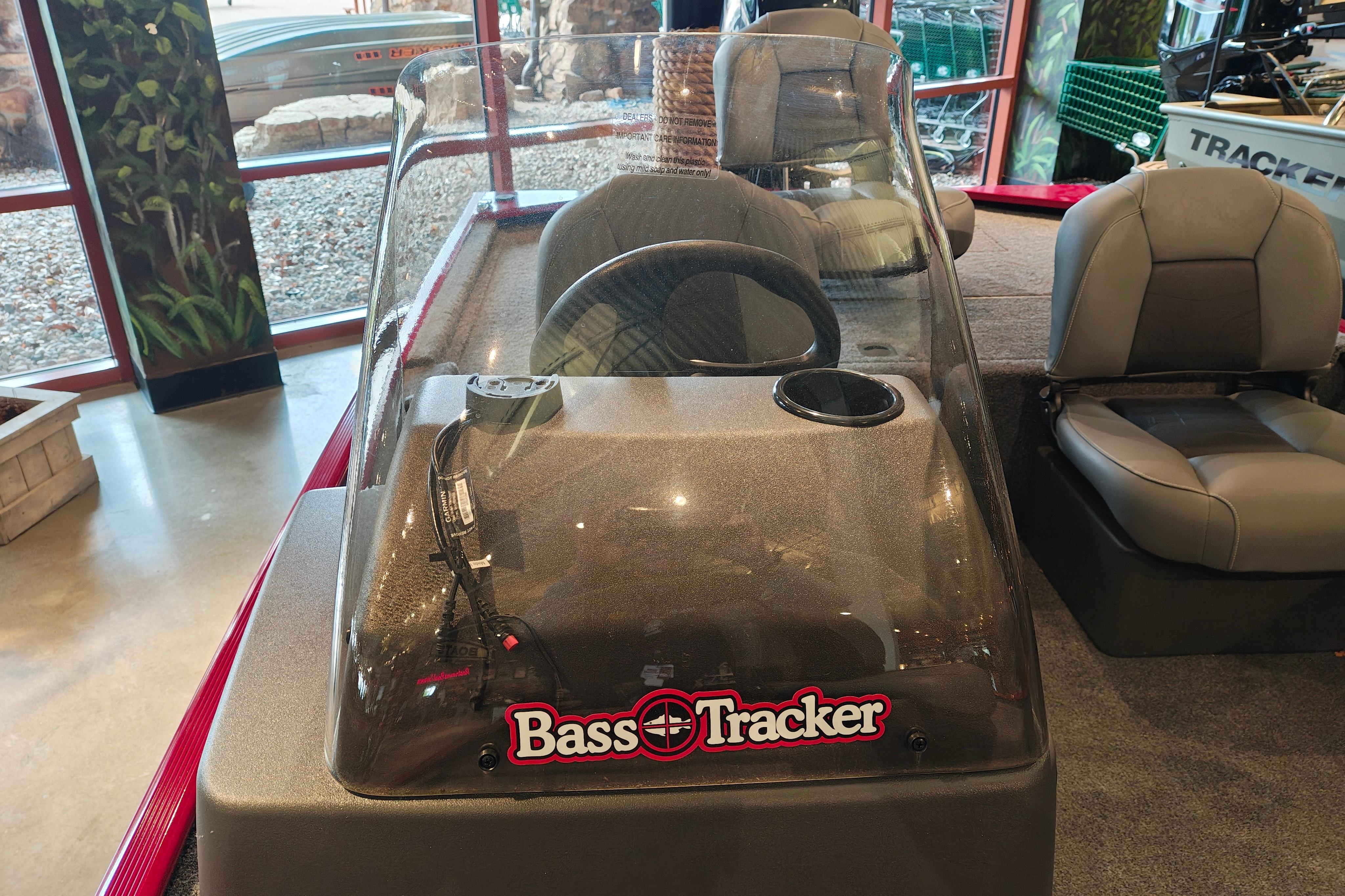 2026 Tracker Bass Tracker Classic XL boat interior with steering wheel and seating.