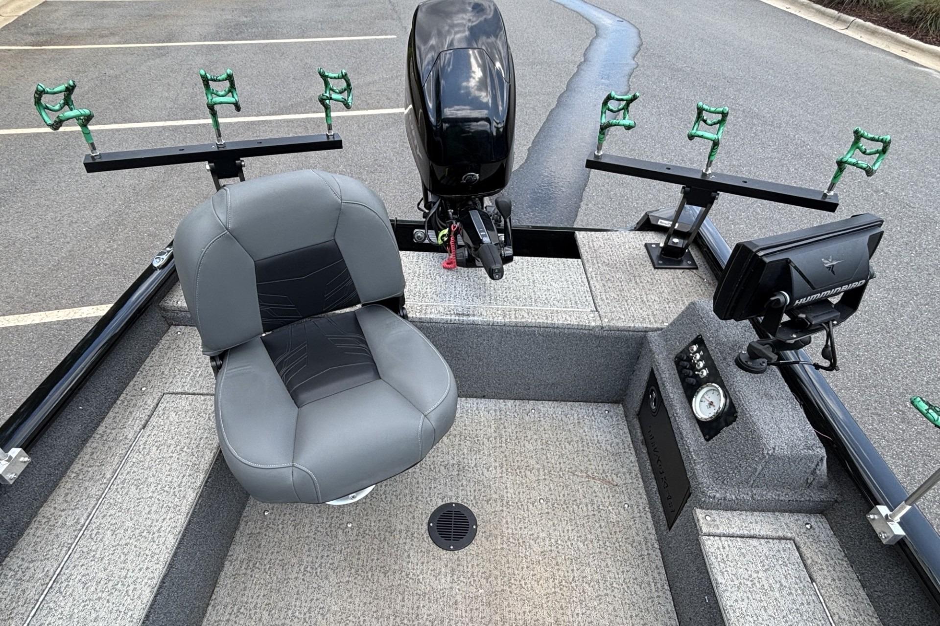 2022 Tracker Super Guide V-16 T fishing boat interior with seating and equipment.