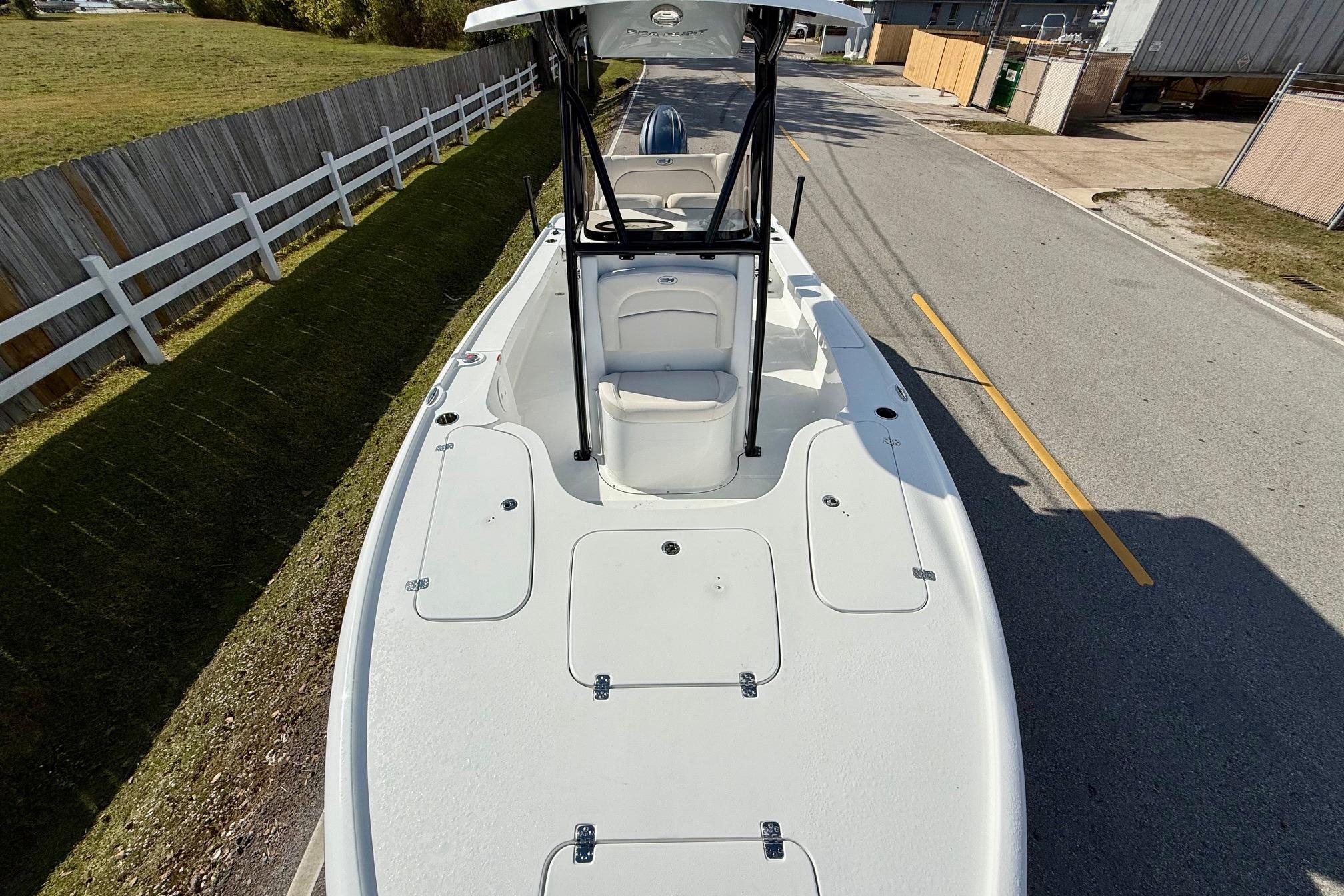 2026 Sea Hunt BX 22 BR boat on a road, showcasing deck and seating.