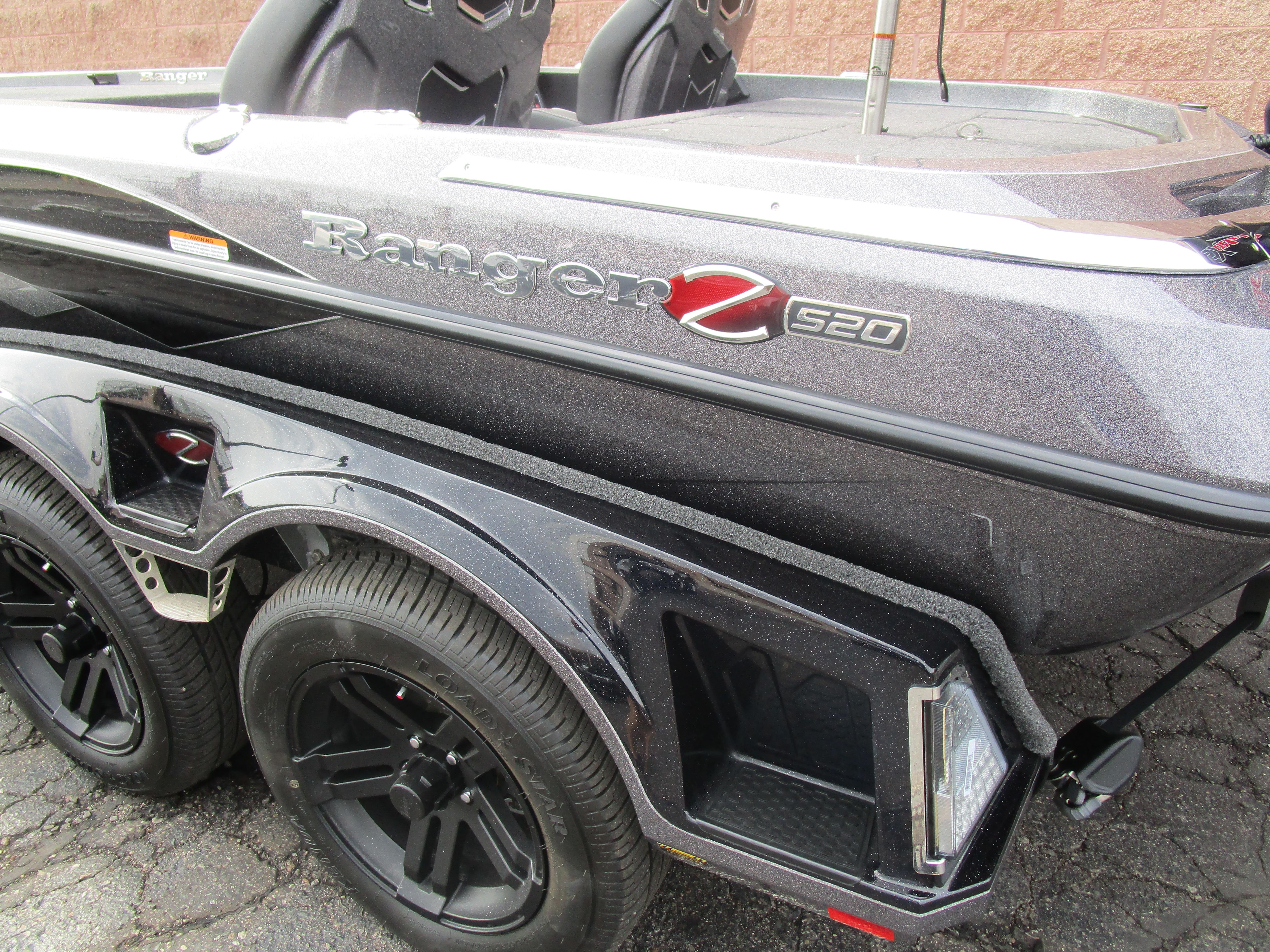 2025 Ranger Z520 boat with sleek design and dual black wheels.