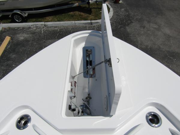 2024 Wellcraft 352 Fisherman boat storage compartment open.