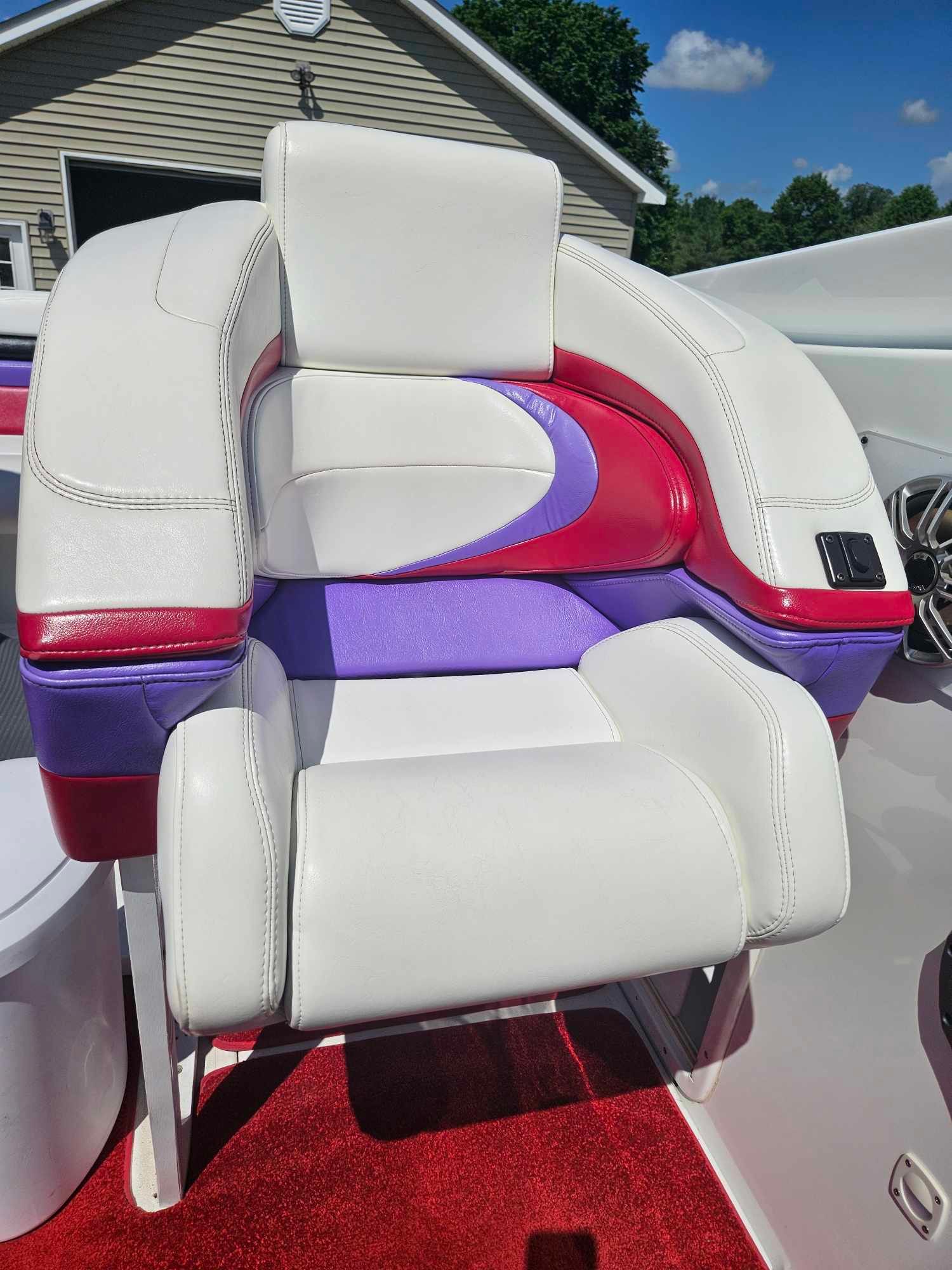 Baja 38 Special Boss 1997 boat seat with colorful upholstery design.