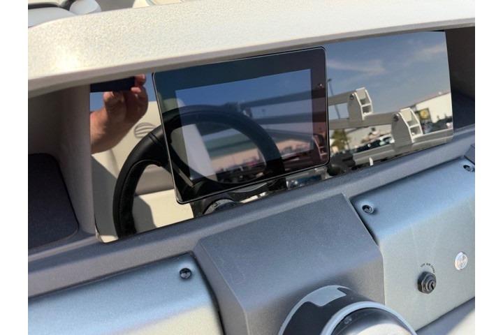 Dashboard of 2026 Sun Tracker Fishin' Barge 20 DLX with digital display.