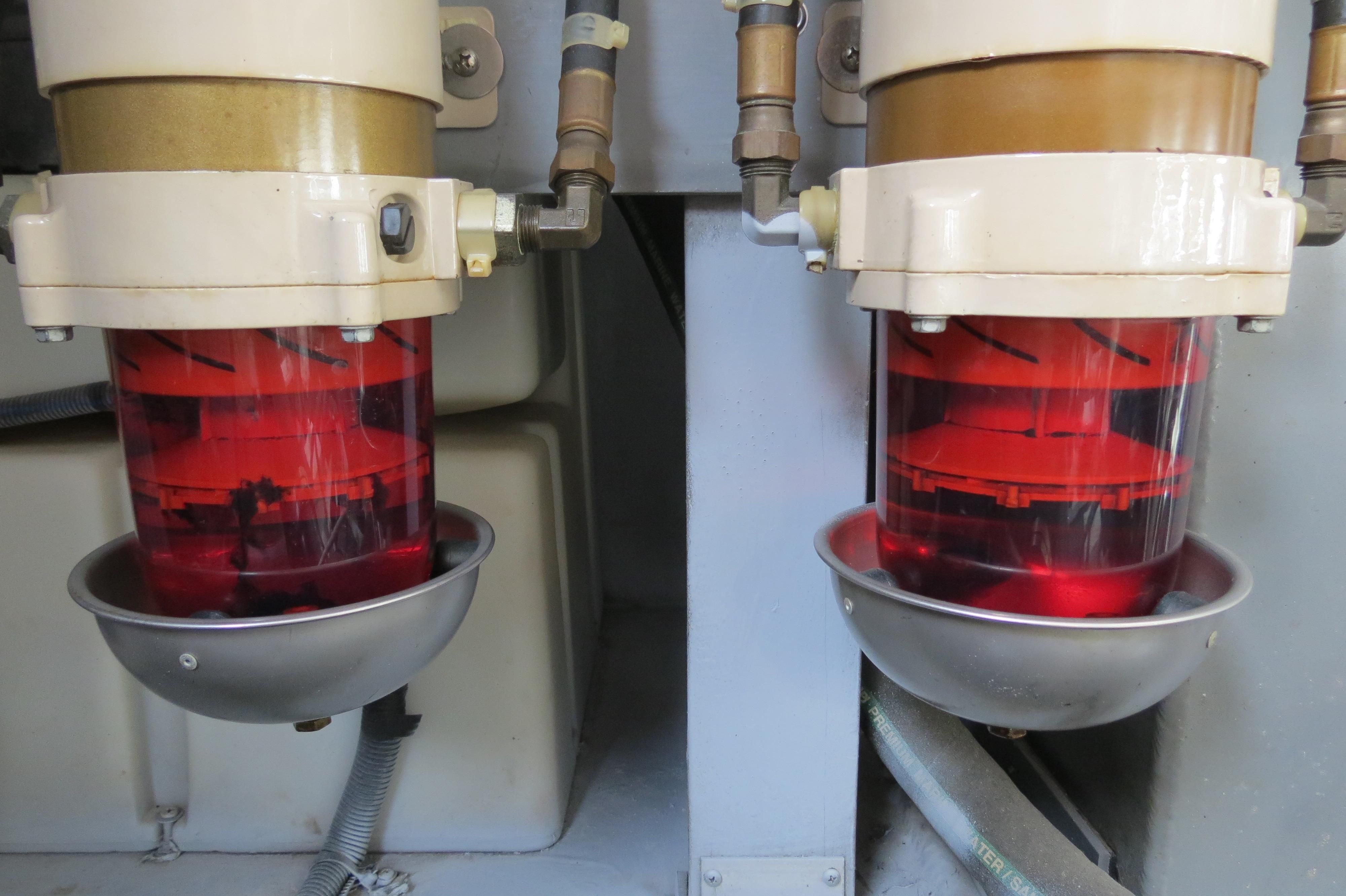 Two fuel filters in the engine room of a 2002 Sea Ray 410 Express Cruiser.