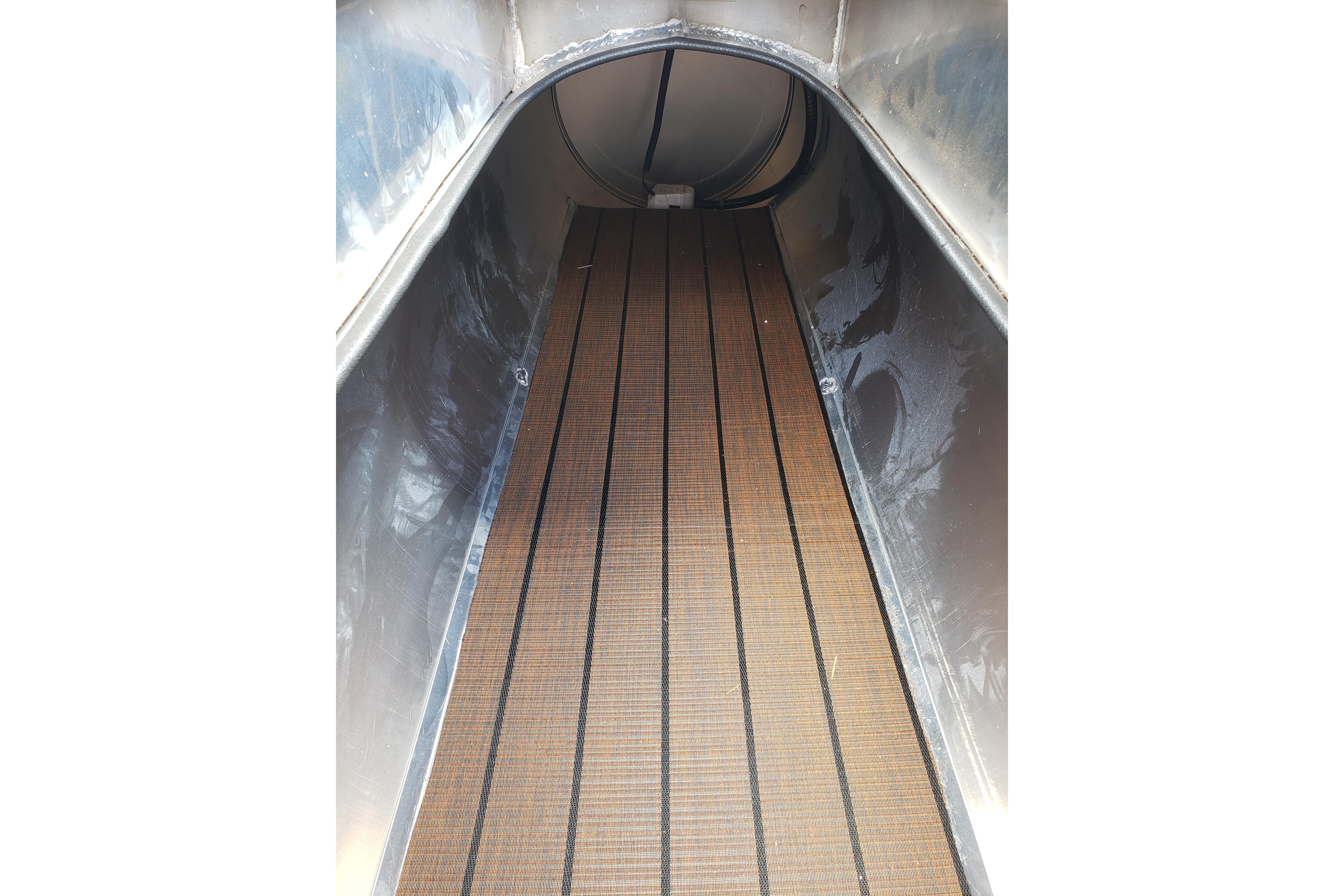 Interior view of 2026 Bentley Pontoons Elite 253 QSB with wooden flooring.