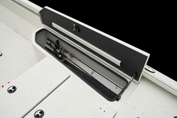 Manufacturer Provided Image: Manufacturer Provided Image: Ranger RB210 2025 boat with open rod storage compartment, showcasing fishing rods.