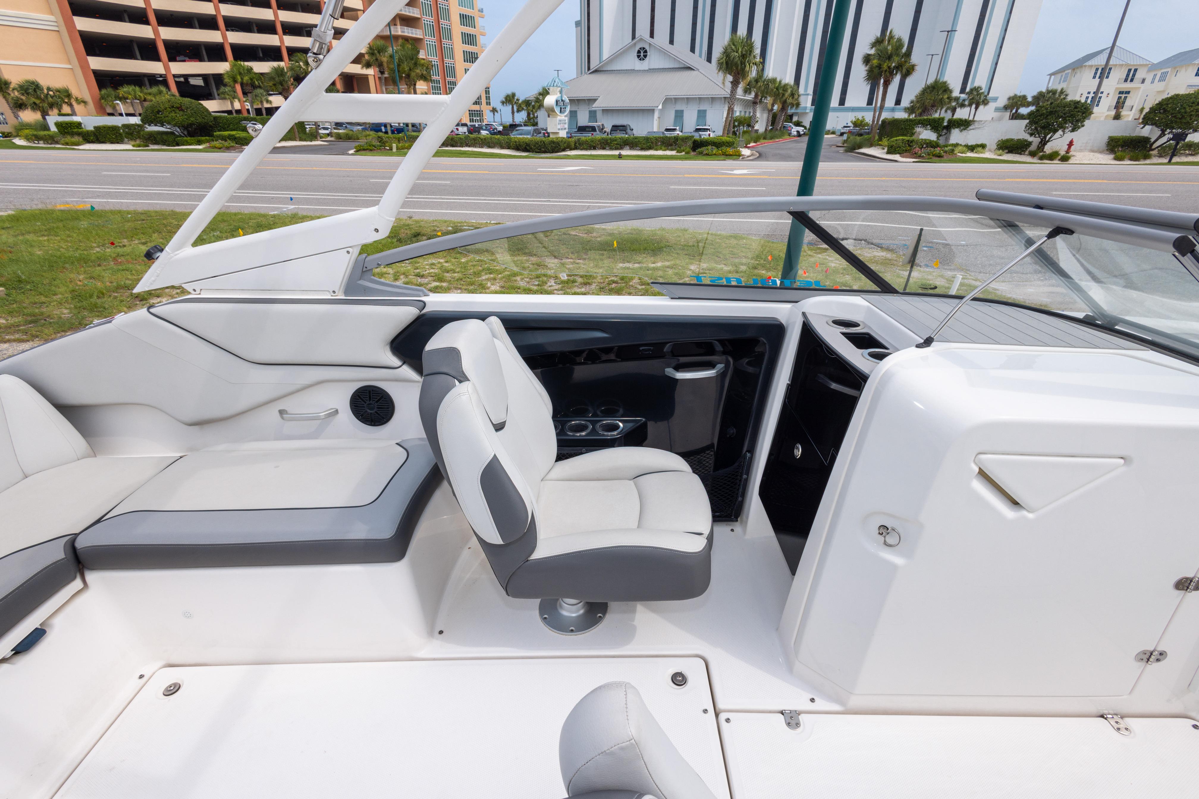 2021 Yamaha Boats AR250 interior with sleek seating and modern dashboard design.