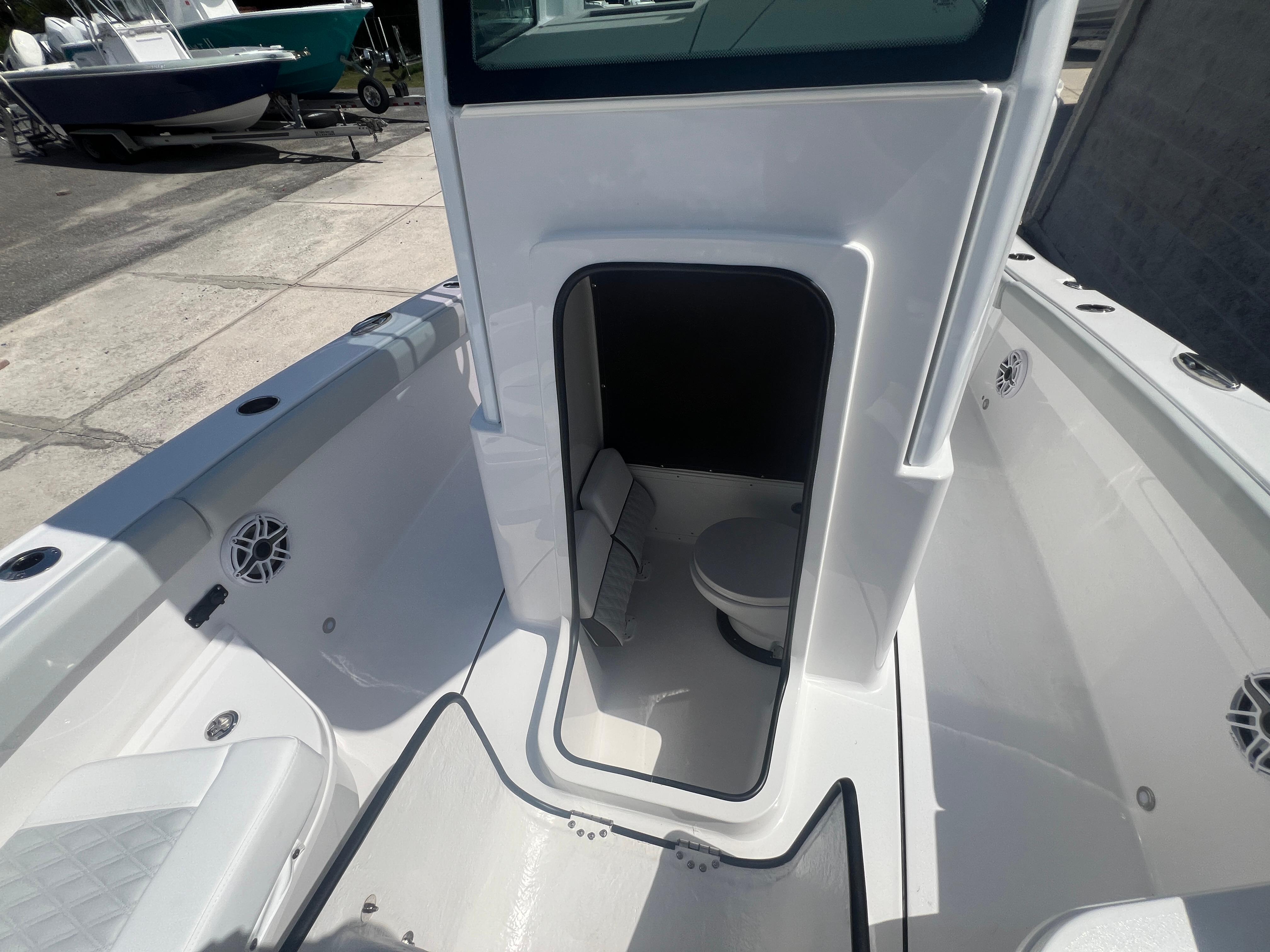 2026 Blackfin 262 HB boat interior with open hatch and visible toilet.