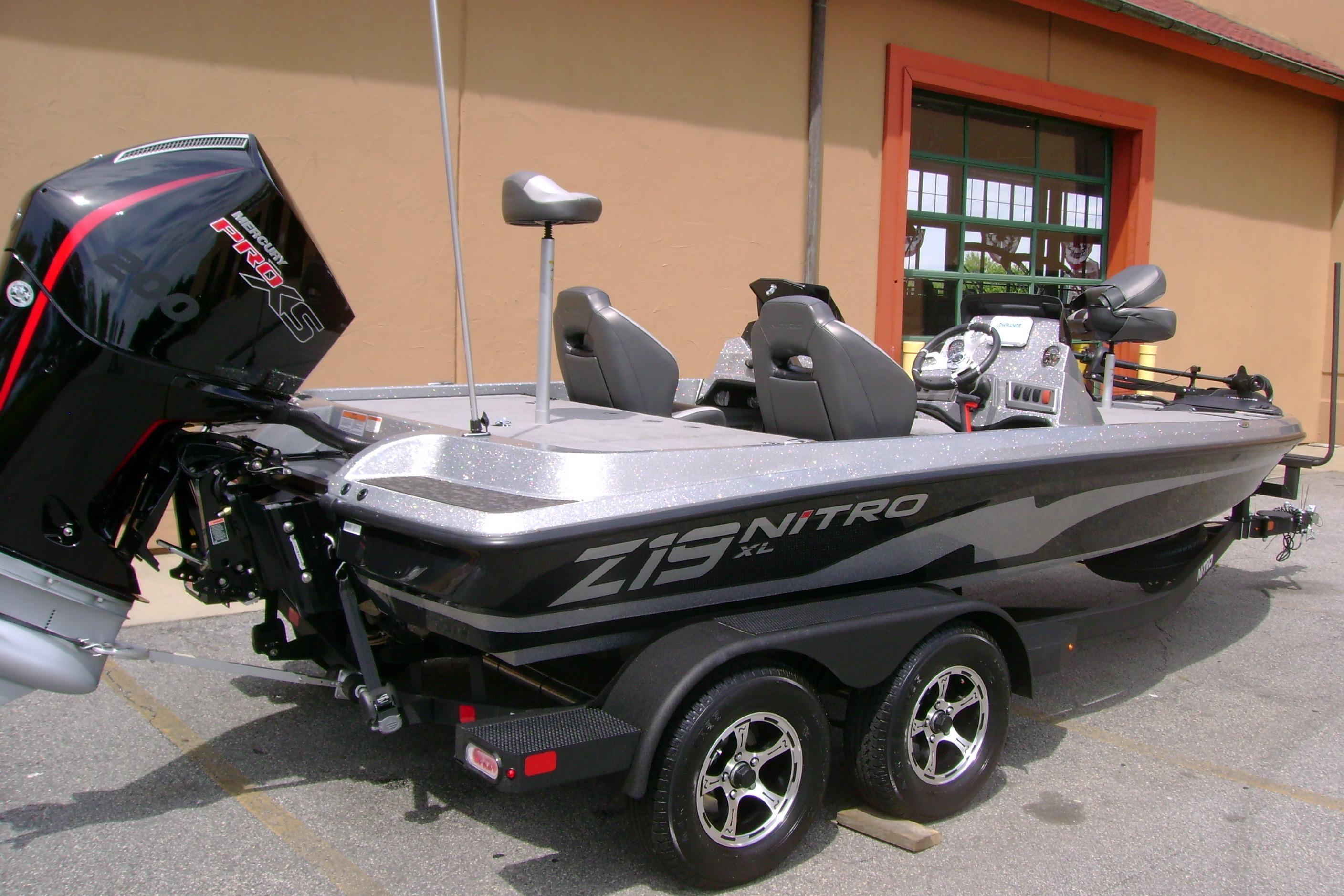 2026 Nitro Z19 XL boat with powerful engine, sleek design, parked on trailer.