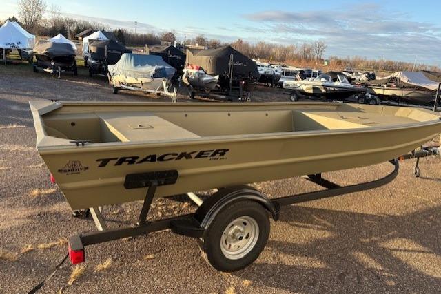 2026 Tracker Grizzly 1754 Utility boat on trailer, parked outdoors in a lot.