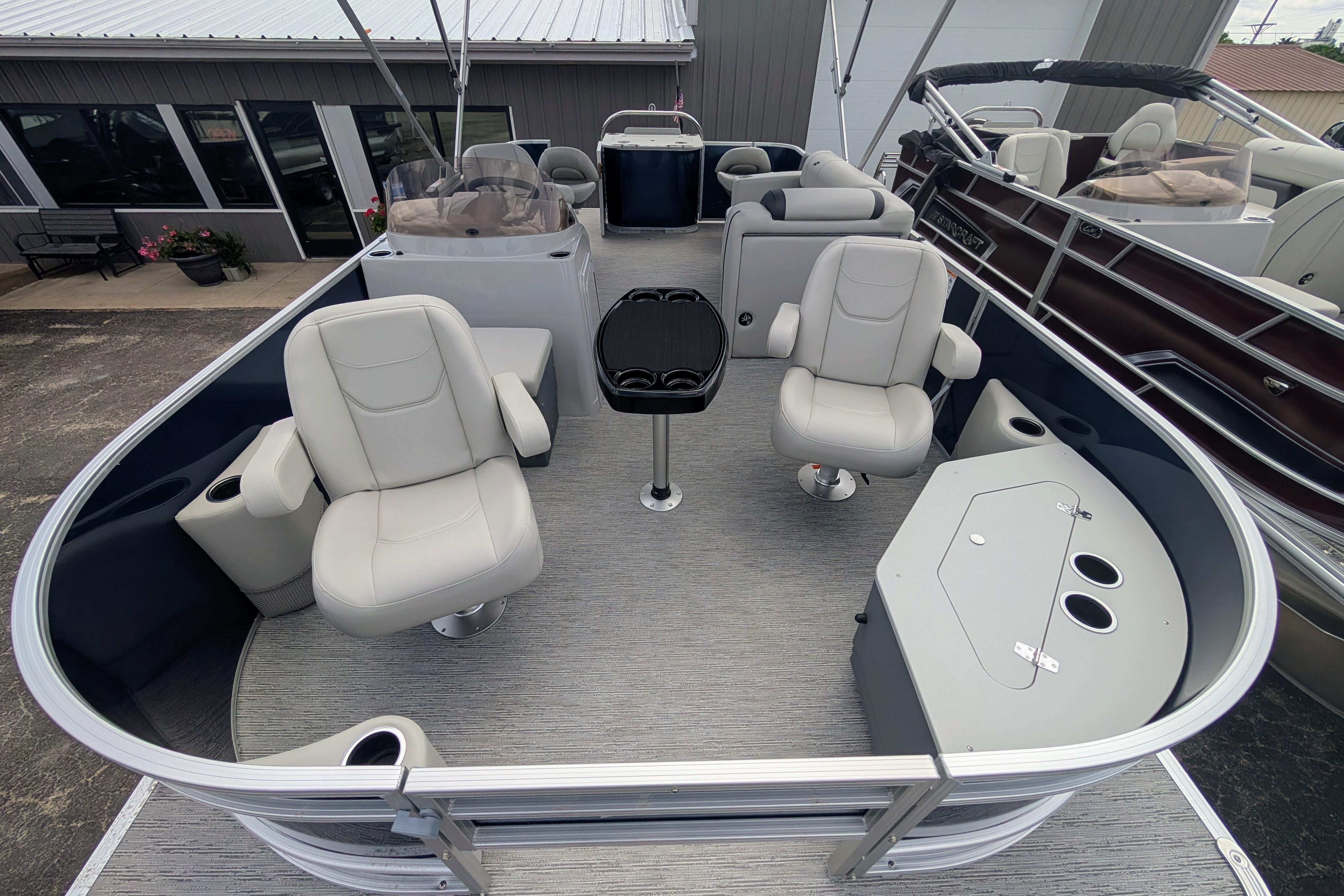 2026 Starcraft EX 20 F pontoon boat interior with seating and console.