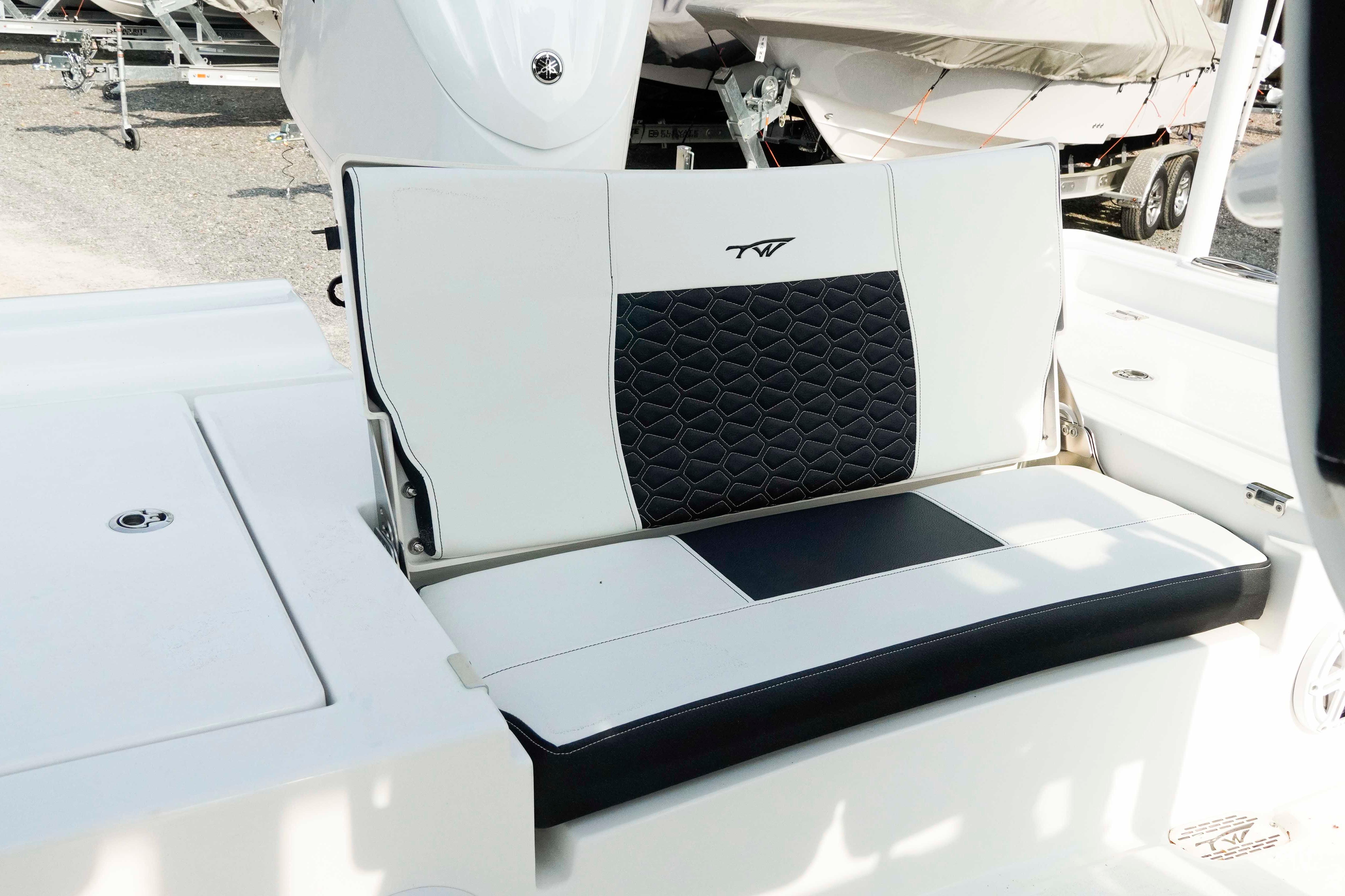 2026 Tidewater 2300 Carolina Bay boat seat with stylish black and white upholstery.