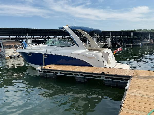 2008 Chaparral Signature 310 boat docked at marina.
