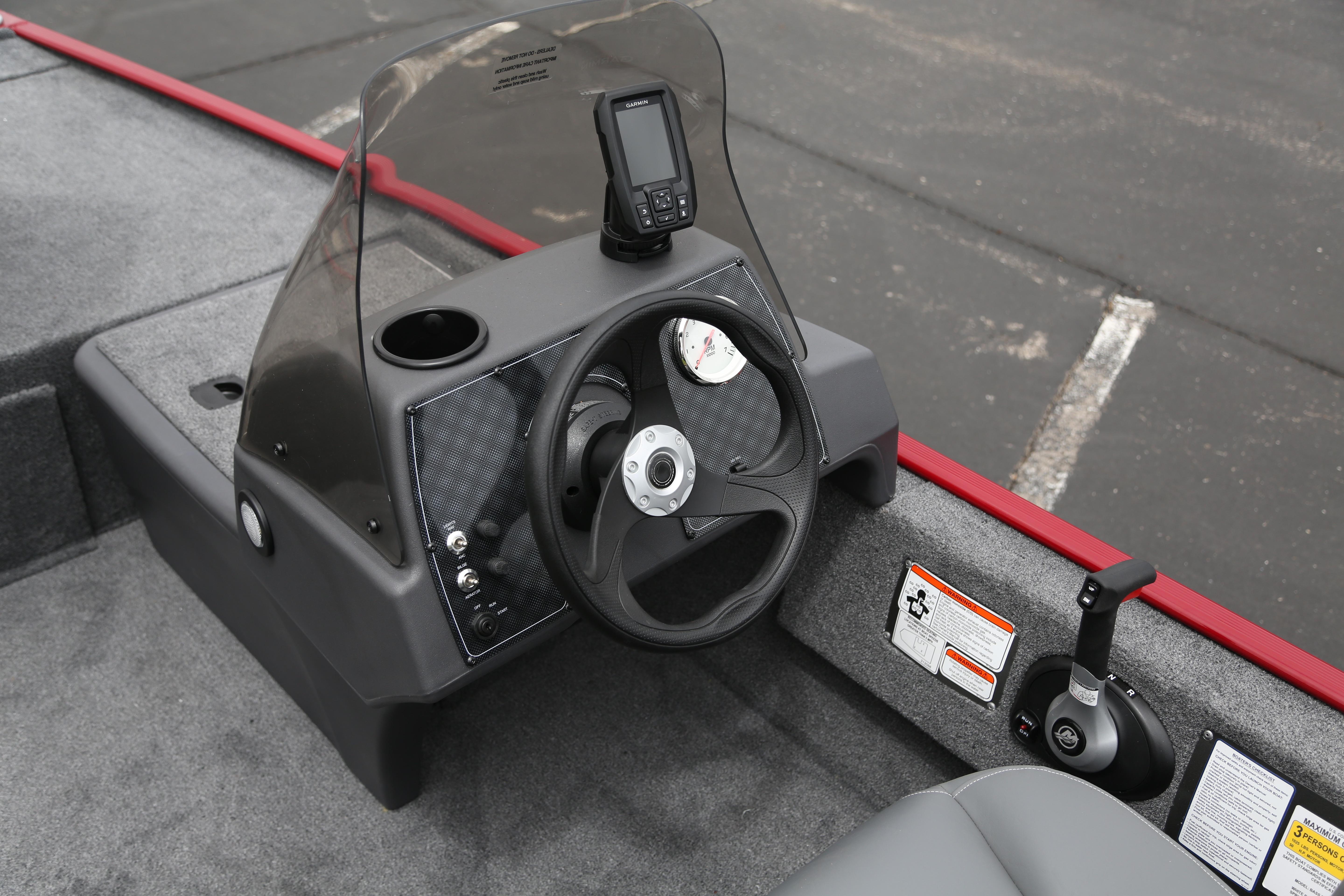 2026 Tracker Bass Tracker Classic XL boat dashboard with steering wheel and control panel.