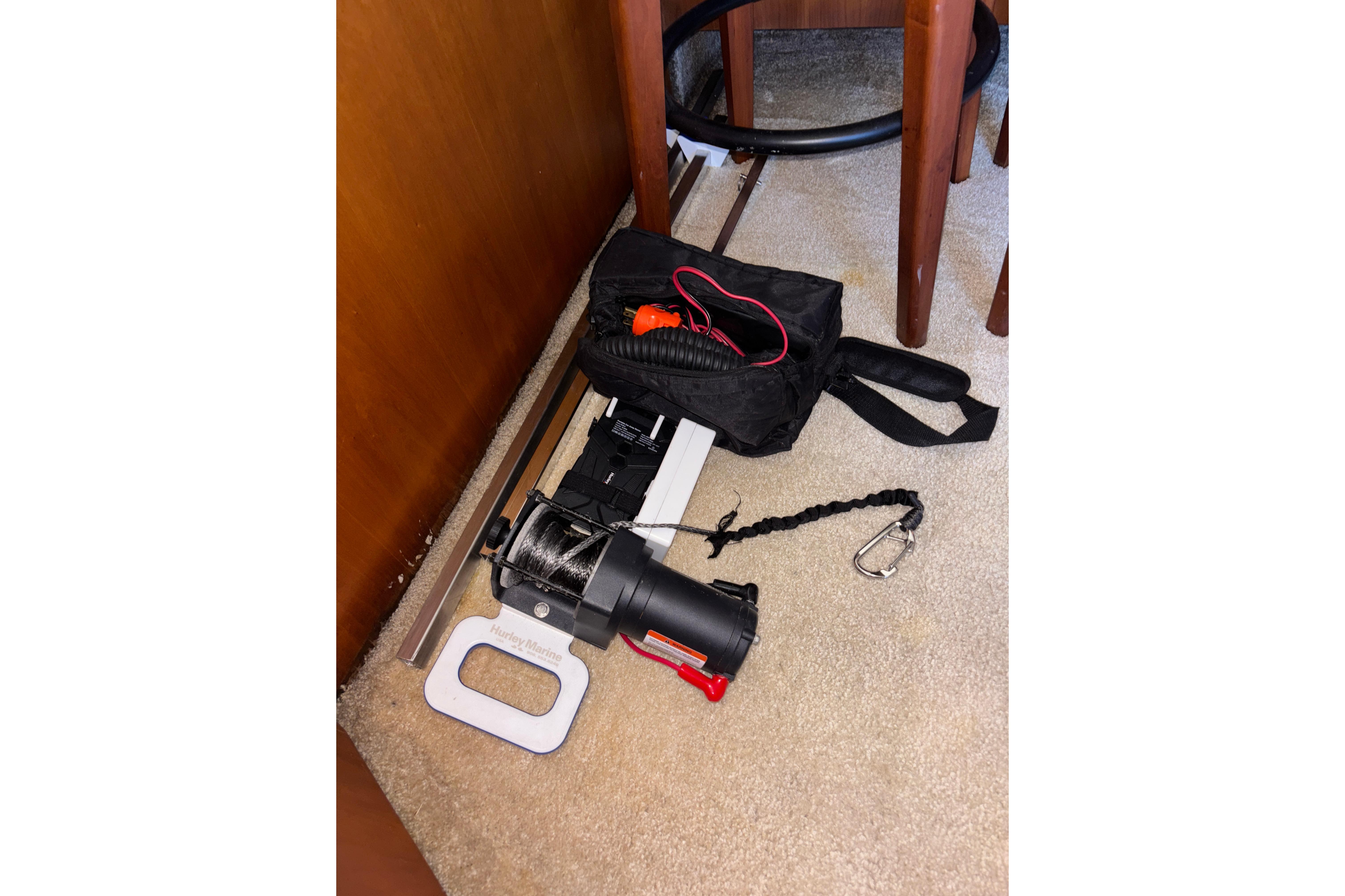 2001 Silverton 410 Sport Bridge interior with boating equipment on carpeted floor.