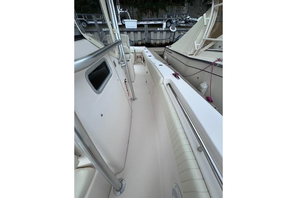 2011 Grady-White Canyon 306 boat interior with sleek design and stainless steel railings.