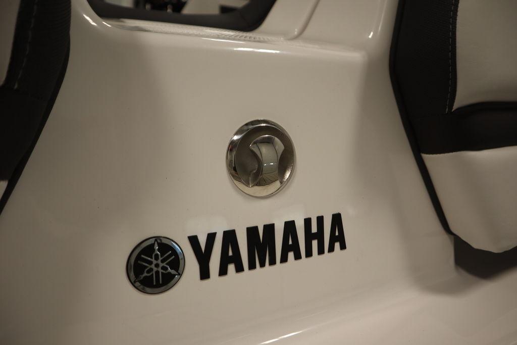 2026 Yamaha Boats 195S logo on white surface, showcasing sleek design.