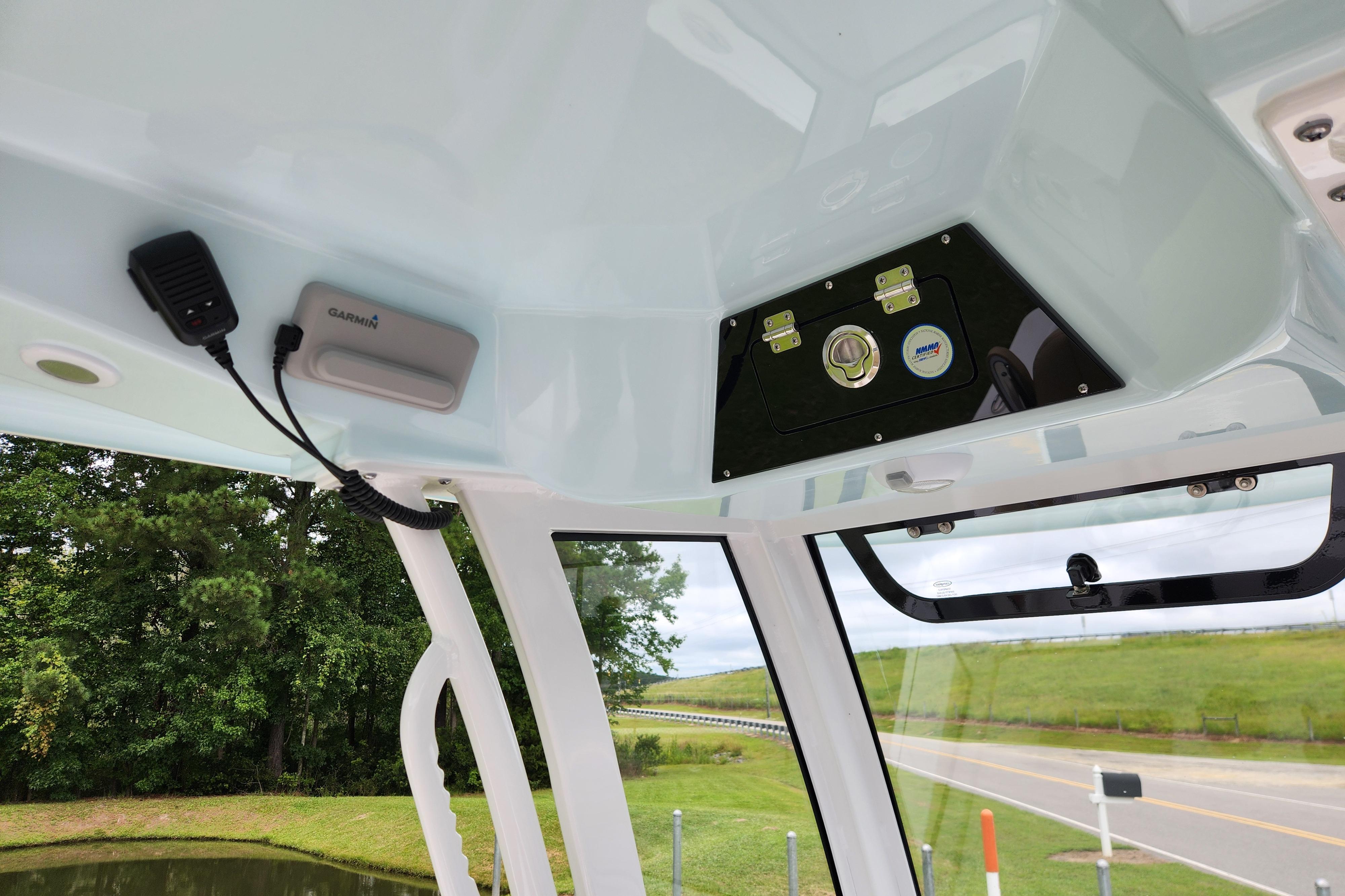 2026 Sportsman Masters 247 Bay Boat interior with Garmin device and control panel.