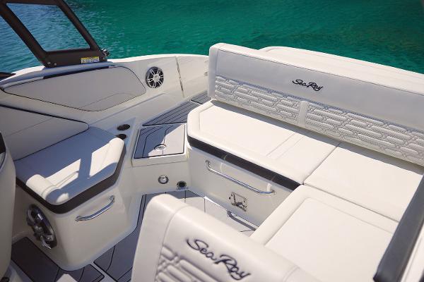 Manufacturer Provided Image: 2025 Sea Ray SPX 210 boat interior with white seating and sleek design.