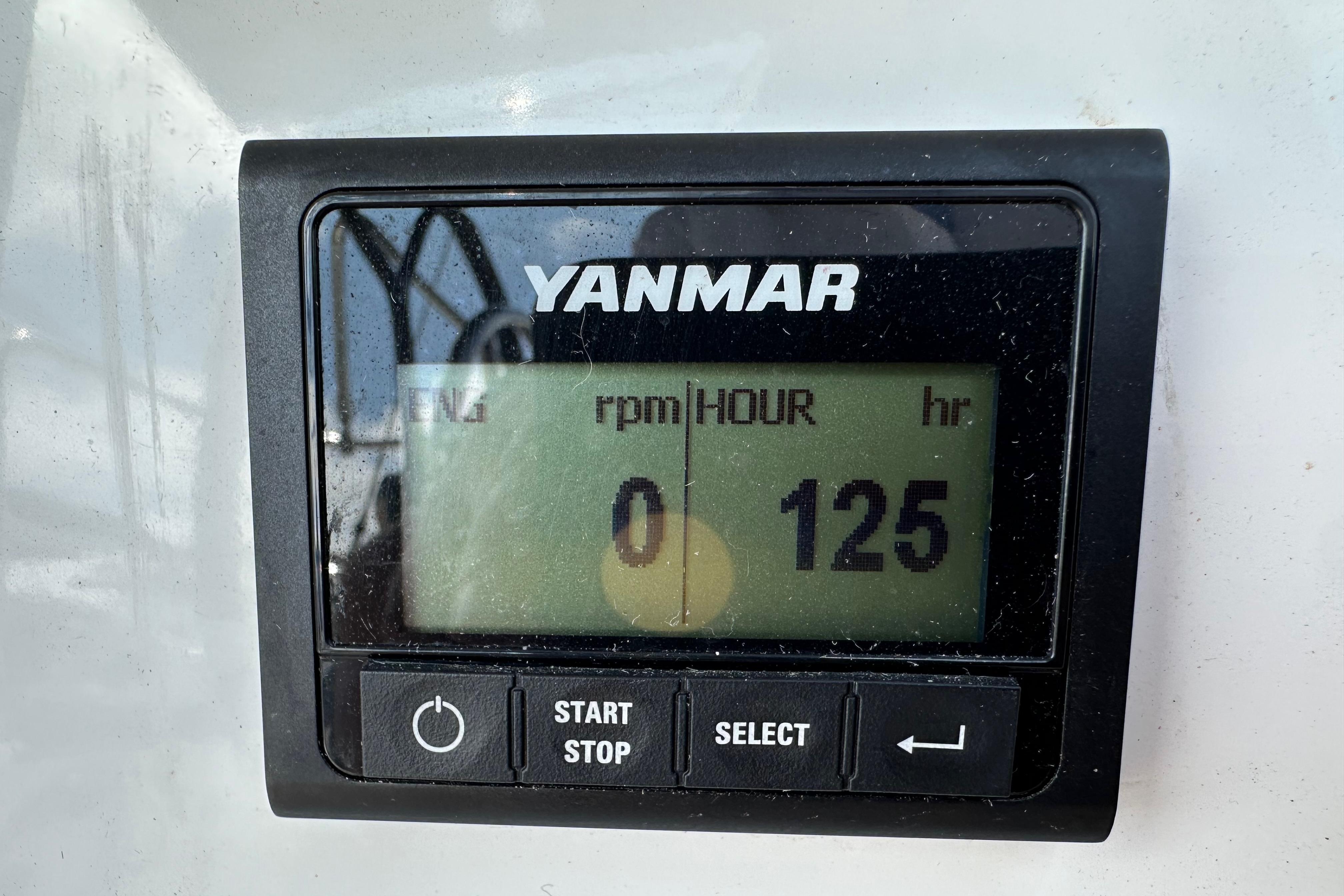 Yanmar engine hour meter displaying 125 hours on Jeanneau Sun Odyssey 410, 2024 model.