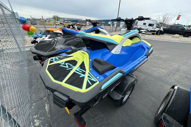 Yamaha WaveRunner JETBLASTER PRO 3 in blue and yellow on a trailer.