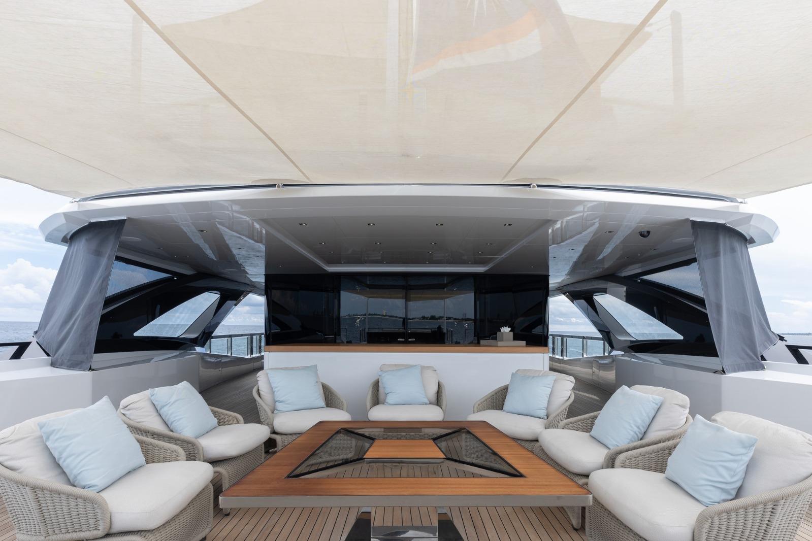 Luxurious 2020 Overmarine Gransport 54 yacht deck with elegant seating and modern design.