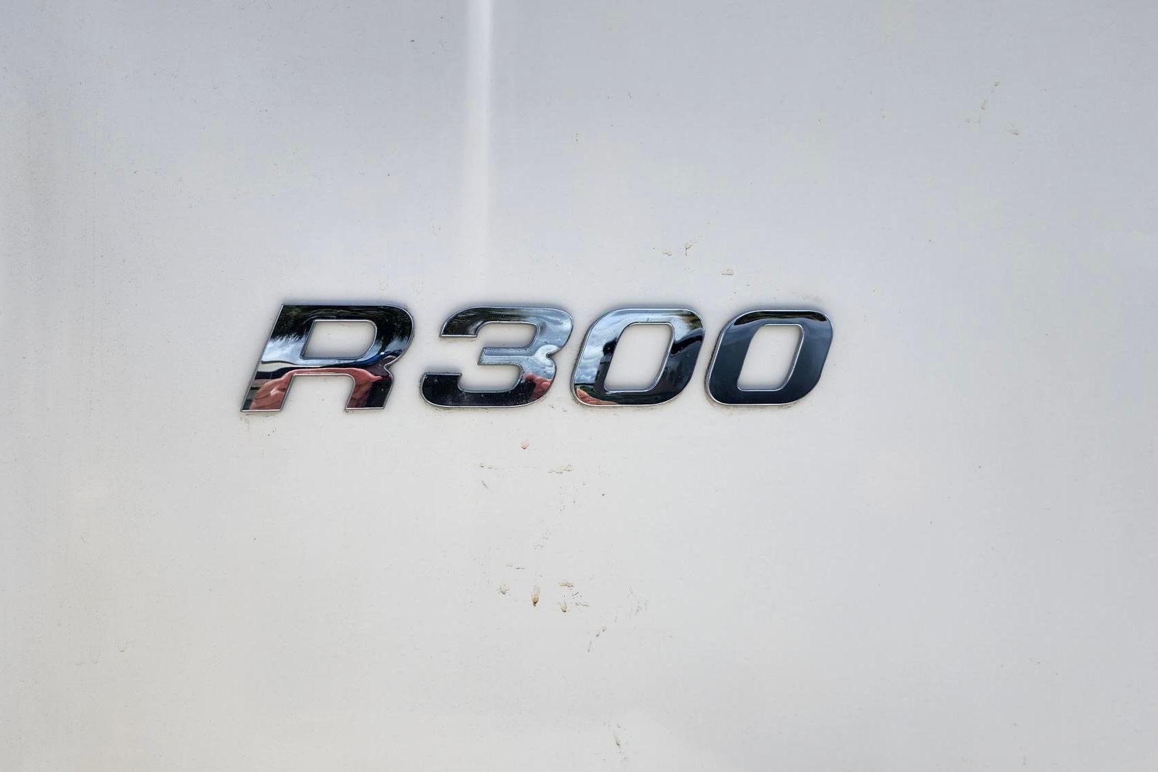 Chrome "R300" emblem on 2015 Robalo R300 Center Console boat.
