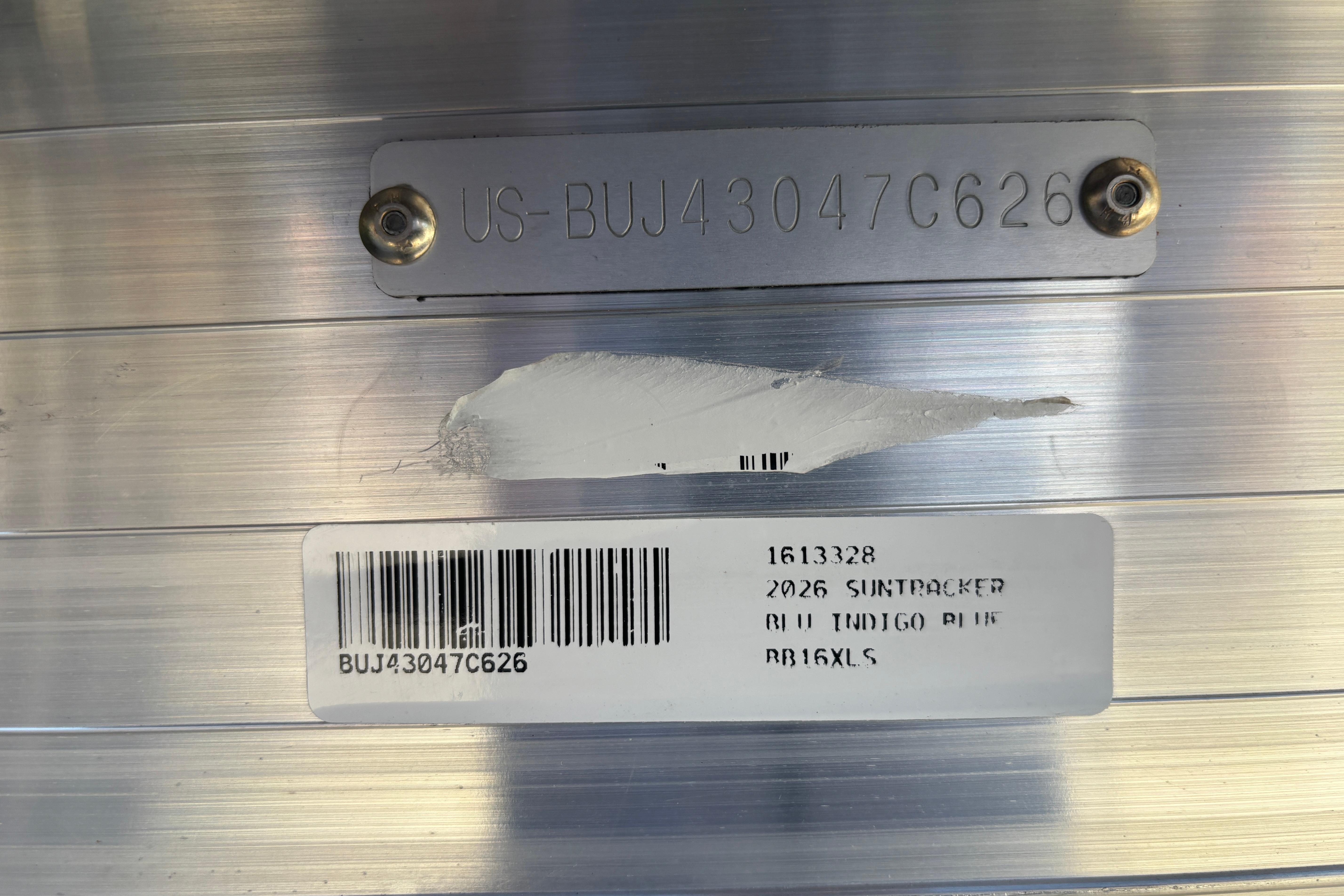 2026 Sun Tracker Bass Buggy 16 XL Select identification plate with serial number and barcode.