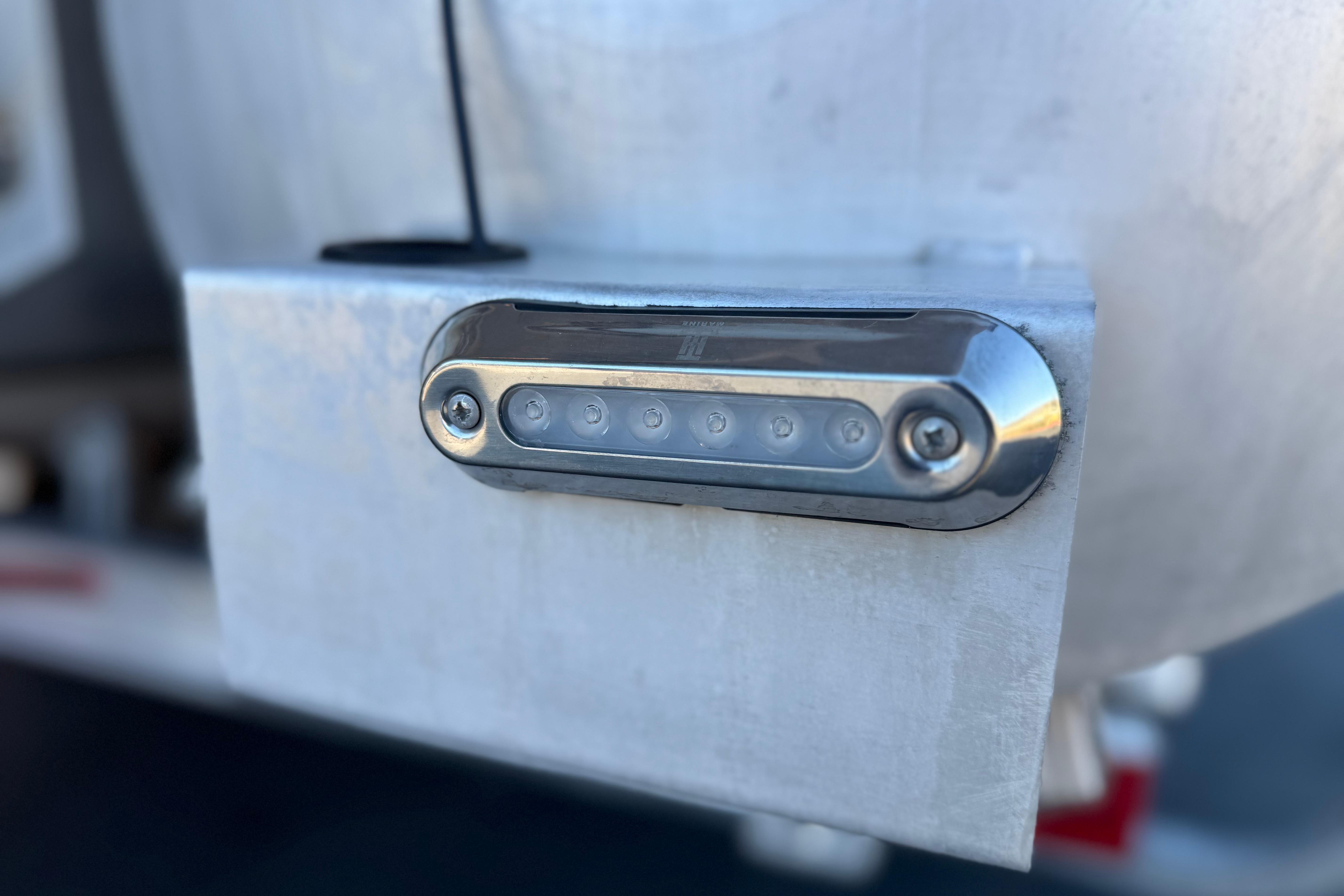 Close-up of a 2013 Bennington 2575QCW I/O boat's LED light fixture.