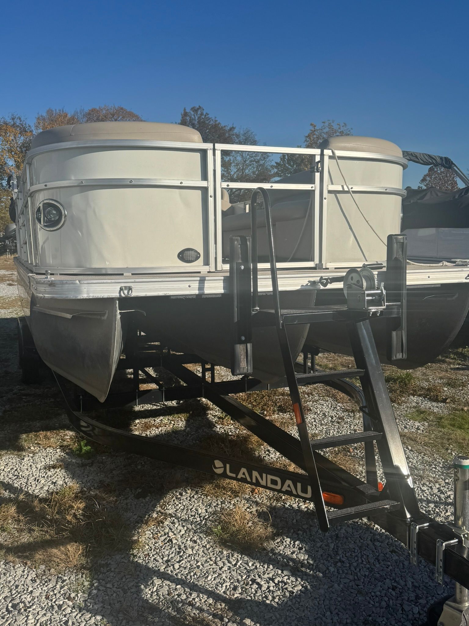 2024 Landau 252 Island Breeze pontoon boat on trailer.