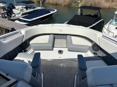 Interior of a 2020 Cobalt SC23 boat at the dock.
